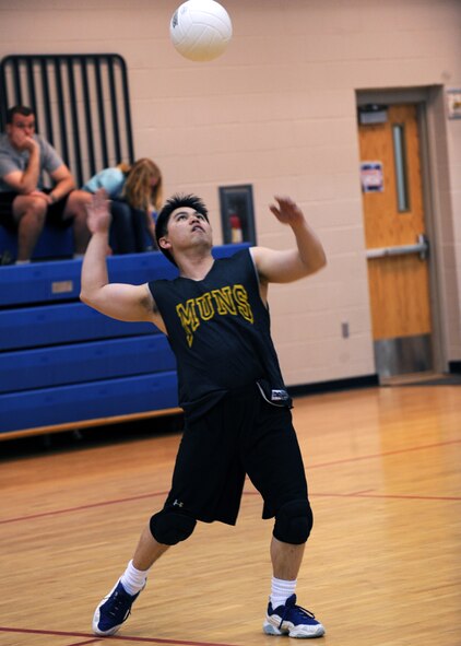 MINOT AIR FORCE BASE, N.D. – Tech. Sgt. Terry Quijano, 17th Munitions Squadron missile maintenance team chief, serves the ball during an intramural volleyball match at the McAdoo Sports and Fitness Center at Minot AFB April 20. The intramural volleyball season runs from April 8 to May 6. (U.S. Air Force photo by Senior Airman Sharida Jackson)