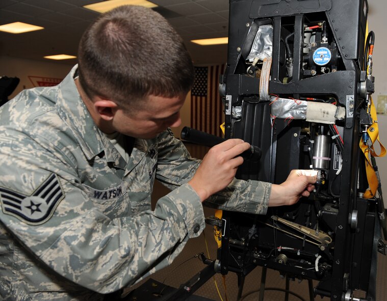 SEYMOUR JOHNSON AIR FORCE BASE, N.C. -- Staff Sgt. Nicholas Watson performs a seven-level visual inspection on an egress unit here April 20, 2010. This inspection is the final step before the unit is installed into a jet. Sergeant Watson, 4th Component Maintenance Squadron egress craftsman, hails from Peebles, Ohio. (U.S. Air Force photo/Airman 1st Class Gino Reyes)