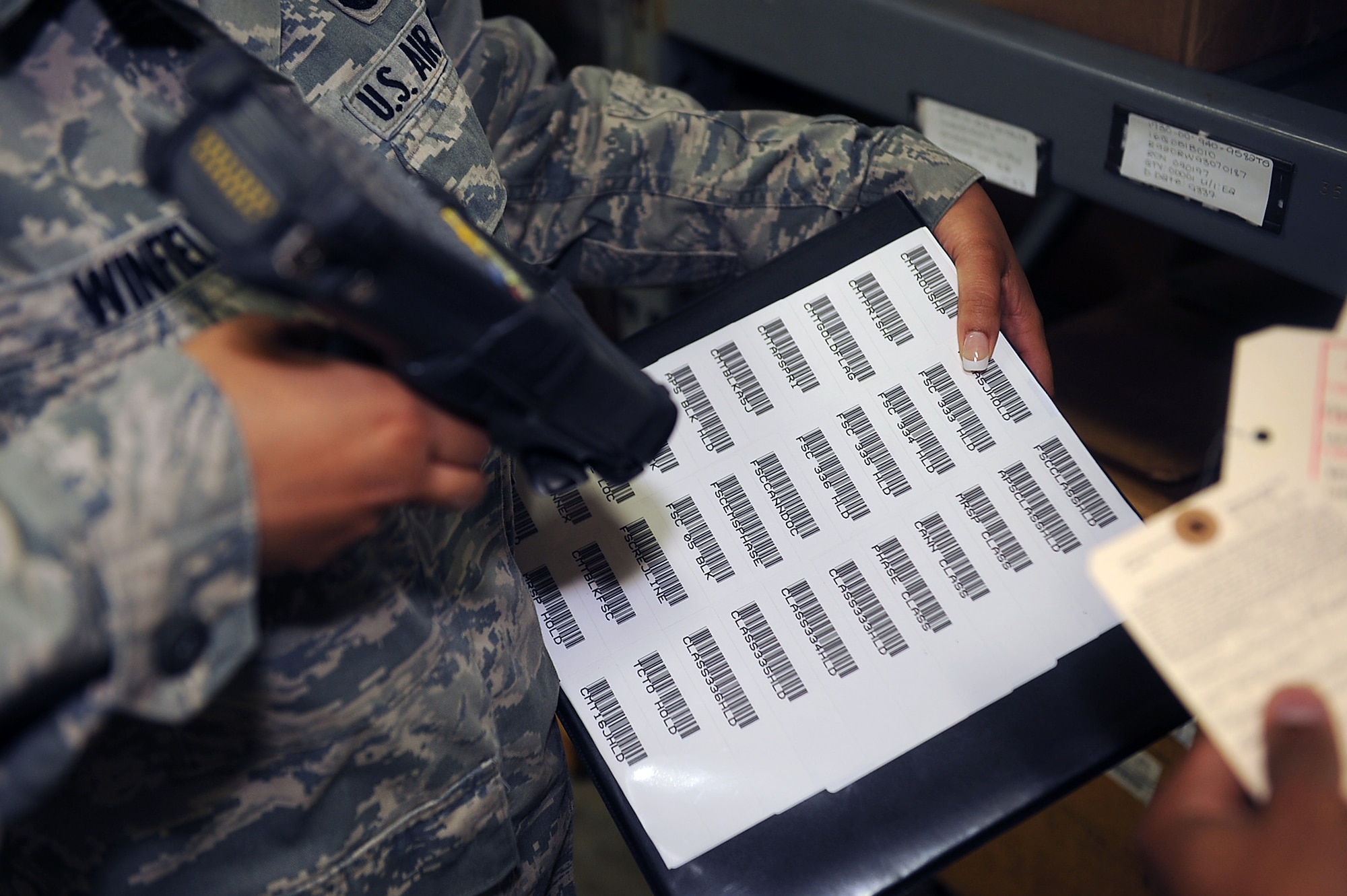 SEYMOUR JOHNSON AIR FORCE BASE, N.C. -- Airman 1st Class Erica Winfield scans inventory label barcodes at the aircraft parts store here April 20, 2010. Scanning barcodes ensures the labels match where the item is located during inventory checks. Airman Winfield is a 4th Logistics Readiness Squadron APS technician and hails from Norfolk, Va. (U.S. Air Force photo/Senior Airman Ciara Wymbs) 