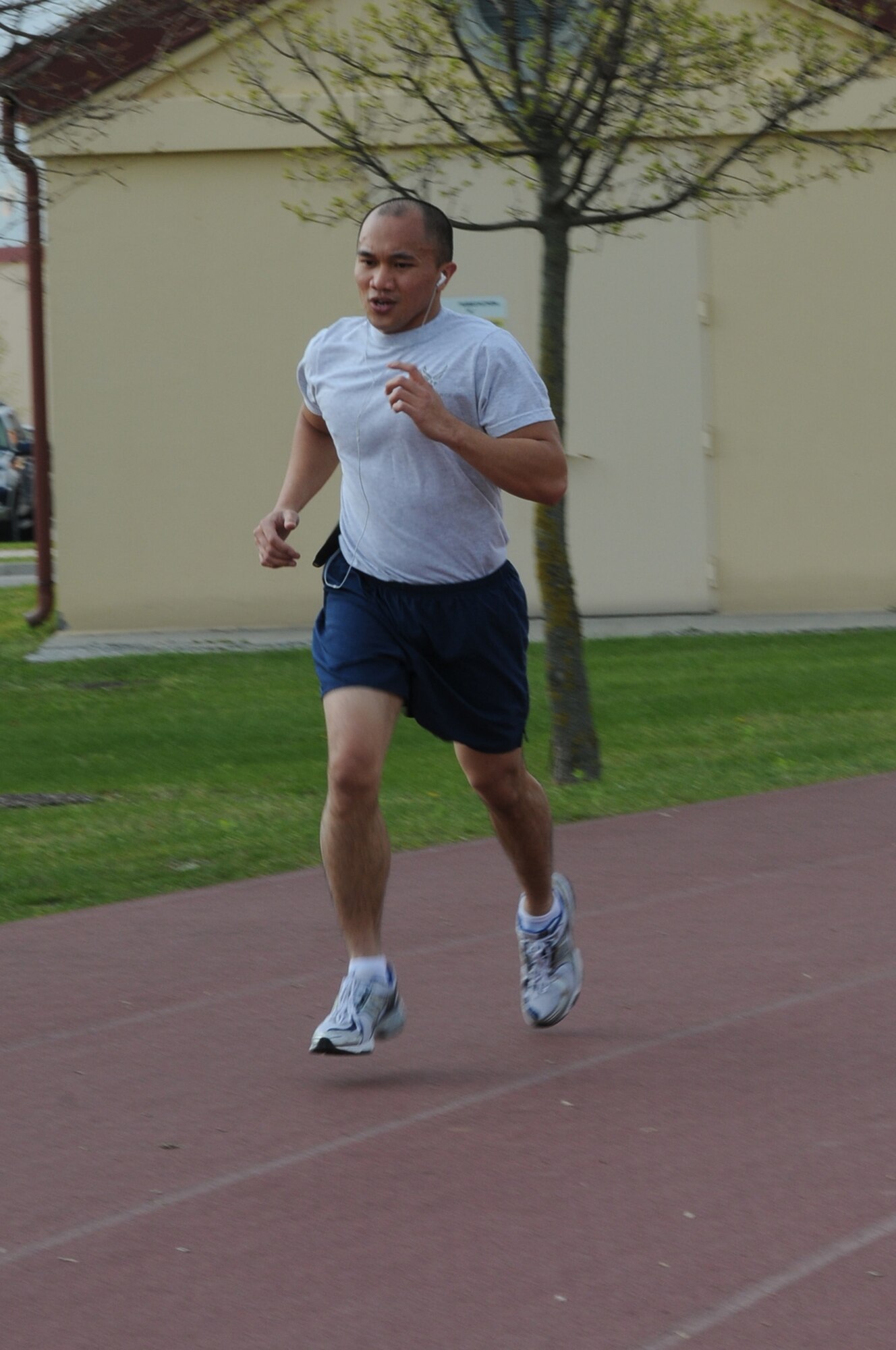 Staf Sgt. Julius V. Delos Reyes, 31st Fighter Wing Public Affairs journeyman, runs 1.5 miles during a mock physical fitness test. Airmen are advised to perform at a minimum of 30 mintues of cardio activity at least three to five times a week to maintain a fit-to-fight body. (U.S. Air Force photo/ Staff Sgt. Nadine Y. Barclay)
