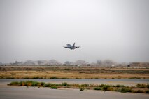 An F16C+ from the 177th Fighter Wing lifts off from the runway of an undisclosed airfield in Southwest Asia on April 7, 2010. 177th unit members, aircraft and support equipment from the Egg Harbor Township, NJ Air National Guard base deployed in support of Operation Iraqi Freedom. U.S. Air Force photo/Master Sgt. Andrew Moseley