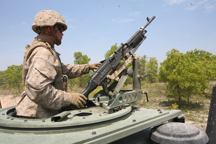 Marines with Combat Logistics Battalion 2, 2nd Marine Logistics Group, test fire a M2 .50 caliber machine gun at the Convoy Live Fire Ambush Range aboard Fort Bragg, N.C., April 23, 2010, as part of the battalion’s field exercise.  The battalion conducted the exercise to simulate combat logistics convoy operations, general engineering, and command and control operations in preparation for their future deployment to Afghanistan.