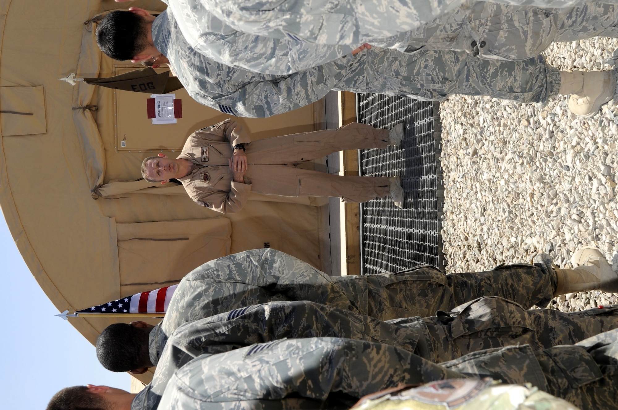 Col. John Cherrey, 451st Expeditionary Operations Group commander, speaks to a crowd during the 79th Expeditionary Rescue Squadron activation April 22 at Camp Bastion, Afghanistan.  Colonel Cherrey presided over the ceremony in which Lt. Col. Mike Hinsch assumed command of the unit.  (U.S. Air Force photo by Senior Airman Nancy Hooks/Released)