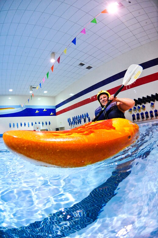 ELMENDORF AIR FORCE BASE, Alaska – Terri Breckberg works on her paddling during a kayak safety class April 22. The class helped prepare participants to react to kayak mishaps. Kayak safety classes are required for anybody renting kayaks from Elmendorf’s Outdoor Recreation Center, or for anybody attending one of OAR’s kayaking trips. (Air Force photo by Airman 1st Class Christopher Gross)