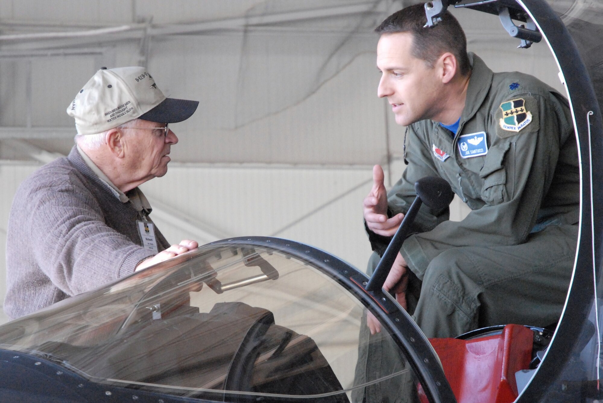 Beale Air Force Base hosted Beale Day 2010 on April 16.  Community and civic leaders from around Northern California were invited to spend the afternoon touring the facilities and learning about the missions of the 9th Reconnaissance Wing and the 940th Wing. Lt. Col. Joseph Santucci, Commander of the 99th Reconnaissance Squadron, explains the cockpit of the U-2 Dragon Lady to Beale Day guest, Mr. Richard Webb. (U.S. Air Force Photo/Airman 1st Class Adam Hamar)
