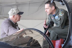 Beale Air Force Base hosted Beale Day 2010 on April 16.  Community and civic leaders from around Northern California were invited to spend the afternoon touring the facilities and learning about the missions of the 9th Reconnaissance Wing and the 940th Wing. Lt. Col. Joseph Santucci, Commander of the 99th Reconnaissance Squadron, explains the cockpit of the U-2 Dragon Lady to Beale Day guest, Mr. Richard Webb. (U.S. Air Force Photo/Airman 1st Class Adam Hamar)