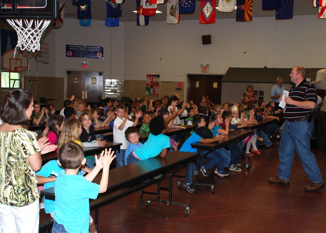 The students of Sheppard Elementary school learn about the effects of recycling during their Earth Day assembly April 22, 2010.  Sheppard Elementary school focused their day around activities intended to raising their student’s awareness on the need to conserve resources and recycle.  (U.S. Air Force photo/Tech Sgt. Vernon Cunningham)
