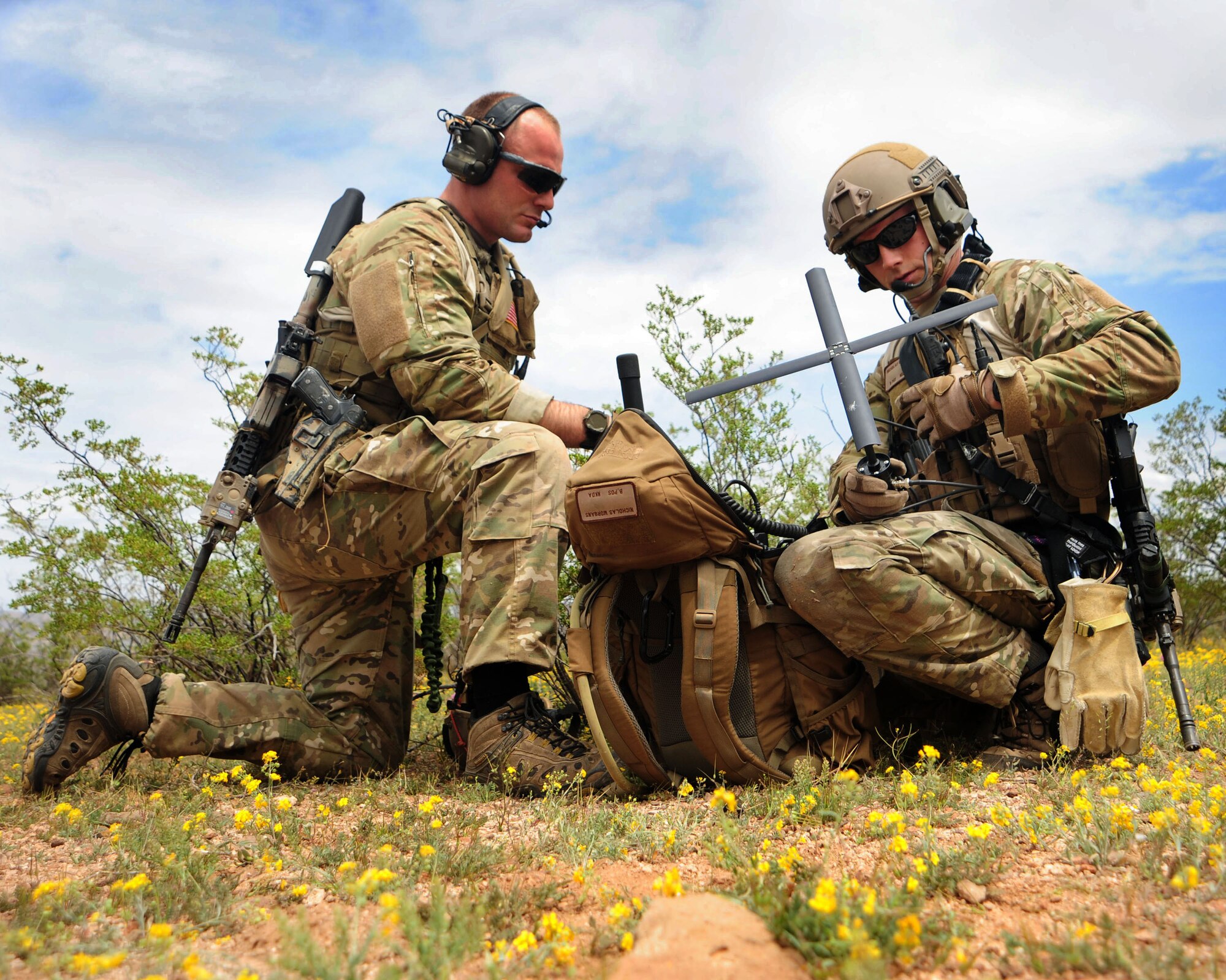 Pararescuemen from the 38th Rescue Squadron assemble a PRC-152 radio April 19 during an earthquake-response exercise scenario as part of Angel Thunder 2010 in Southern Arizona. (U.S. Air Force photo/Airman Jerilyn Quintanilla)