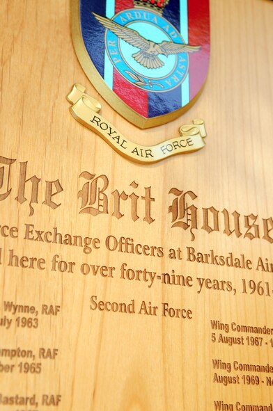 BARKSDALE AIR FORCE BASE, La. – The recently unveiled plaque destined to hang in 203 Daedalus Avenue proclaims the house to forever be known as the ‘Brit House’. The plaque will hang in the entrance hall of the historic home listing all the Royal Air Force Exchange Officers who have lived at that address over the past 40 years as the EO position moves to Lackland Air Force Base, Texas. (U.S. Air Force photo by Senior Airman Joanna M. Kresge)