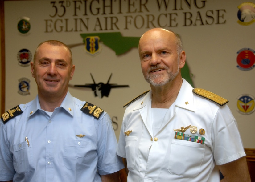 Brig. Gen. Roberto Nordio, Italian Air Force Logistic Department chief, and Rear Admiral Paolo Treu, director of Naval Aviation Department and commander of the Italian Fleet Air Arm, visited the 33rd Fighter Wing April 20 in an effort to check the progress of the first F-35 integrated training center and learn more about this new coalition venture.  (U.S. Air Force photo/Samuel King Jr.)
