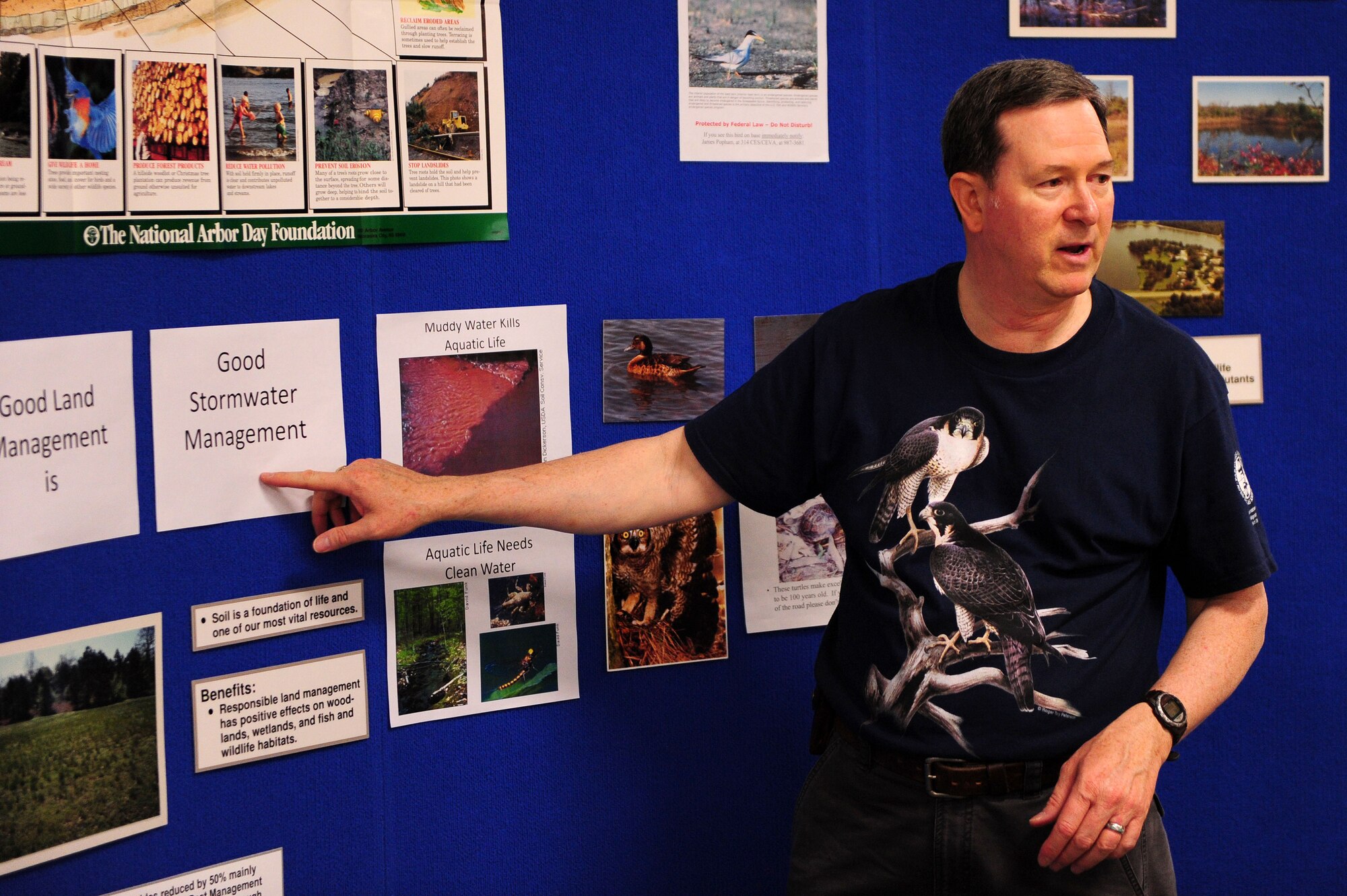 James Popham, 19th Civil Engineer Squadron natural resources manager, talks about storm water management April 22 at Tolleson Elementary School in Jacksonville, Ark. Students came together for Earth Day to learn better ways of utilizing nature's assets. (U.S. Air Force photo by Senior Airman Steele C. G. Britton)