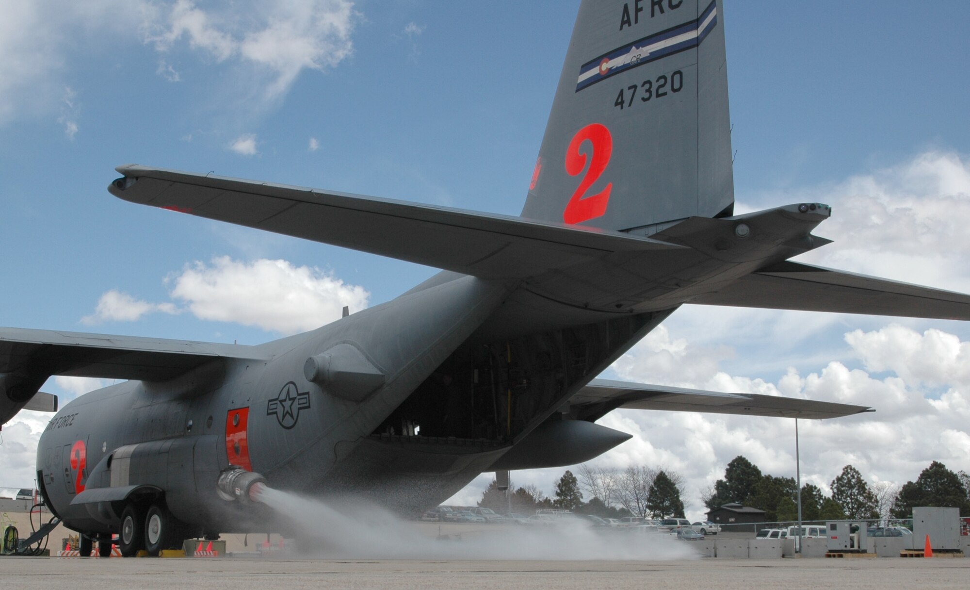 Air Force Reserve C-130 Hercules loadmasters fire the Modular Airborne Firefighting System II unit April 22 during the 302nd Airlift Wing's annual MAFFS wet fire test at Peterson Air Force Base, Colo. The wing test fired the new "MAFFS II" system in preparation for the U.S. Forest Service's MAFFS certification week April 25-May 1 in Greenville, S.C. (U.S. Air Force photo/Staff Sgt. Stephen J. Collier)
