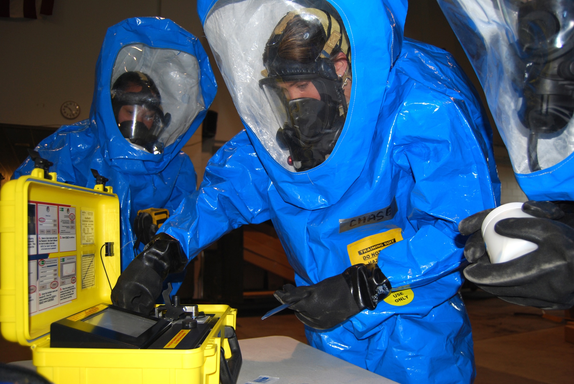 Senior Airman Rebecca Chase, 341st Civil Engineer Squadron emergency management technician, adjusts the HAZMAT ID, a detection device used by the CERF team to classify unidentified substances.(U.S. Air Force photo/Airman 1st Class Kristina Overton)