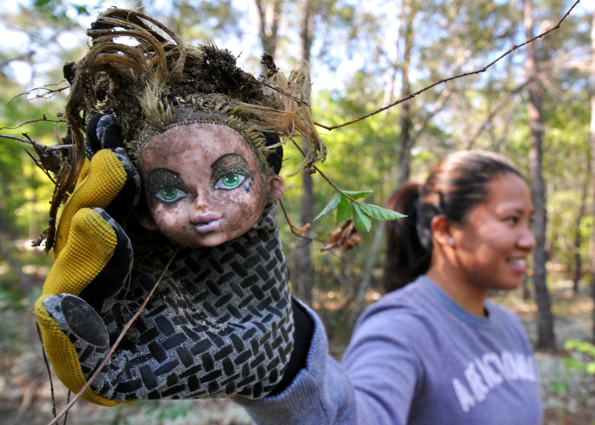 Senior Airman Levi Santos, 96th Logistics Readiness Squadron, shows an example of the garbage found throughout the Eglin Air Force Base range April 21.  30 volunteers picked up 5,400 pounds of garbage this year.  The range clean-up is an annual event that coincides with Earth Day.  (U.S. Air Force photo/Airman 1st Class Anthony Jennings.)
