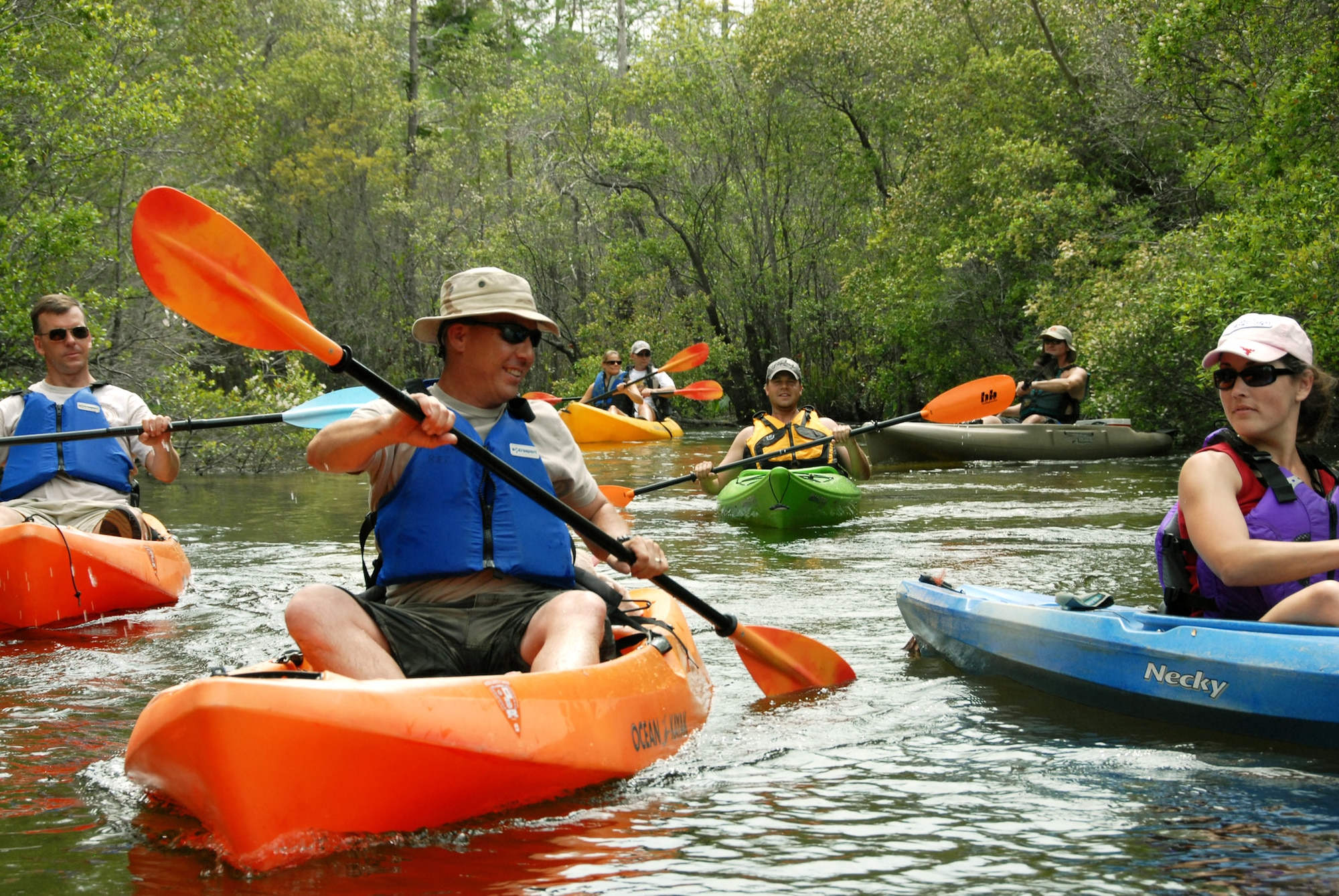 Kayakers enjoy drifting down Boiling Creek April 19 during the first-ever Kayak tour through the Eglin Air Force Base range.  The five and a half mile kayak tour took 10 people down Boiling Creek and the Yellow River deep within the Eglin range.  The scenic tour showed off Eglin’s unique wild and plant life.  It kicked off Eglin’s week-long Earth Day celebration.   (U.S. Air Force photo/Samuel King Jr.)