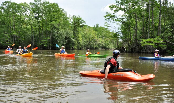 Kayakers leave Boiling Creek and enter the Yellow River during the first-ever Kayak tour through the Eglin Air Force Base range.  The five and a half mile kayak tour took 10 people down Boiling Creek and the Yellow River deep within the Eglin range.  The scenic tour showed off Eglin’s unique wild and plant life.  It kicked off Eglin’s week-long Earth Day celebration.   (U.S. Air Force photo/Samuel King Jr.)