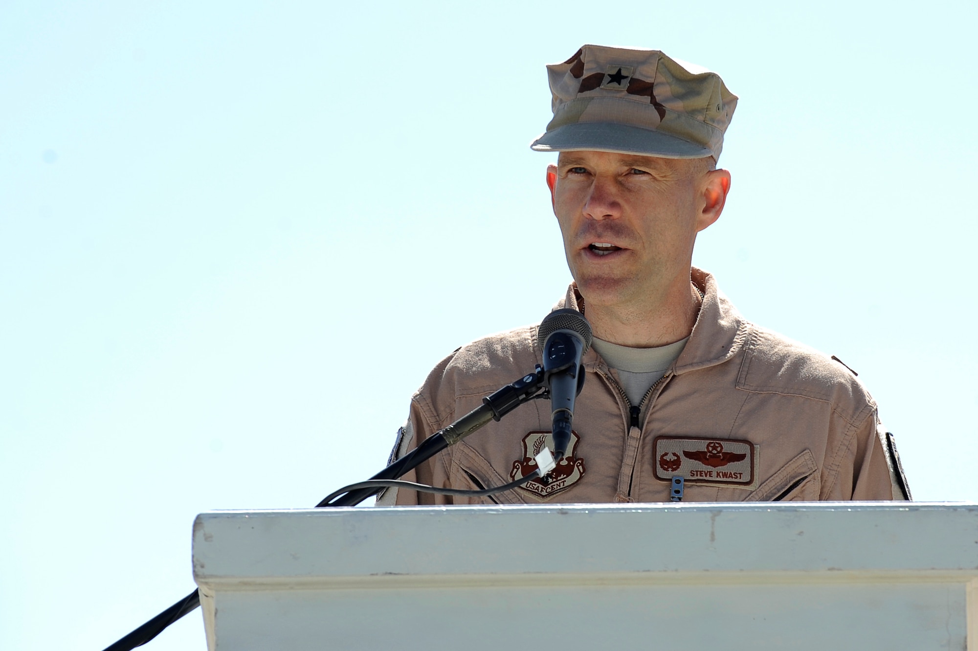 U.S. Air Force Brig. Gen Steven Kwast reflects on his time as the commander during the 455th Air Expeditionary Wing change of command ceremony at Bagram Airfield, Afghanistan, April 23, 2010. During the ceremony Brig. Gen. Steven Kwast transferred command to Col. Jack Briggs. (U.S. Air Force photo by/ Tech. Sgt. Jeromy K. Cross/released)