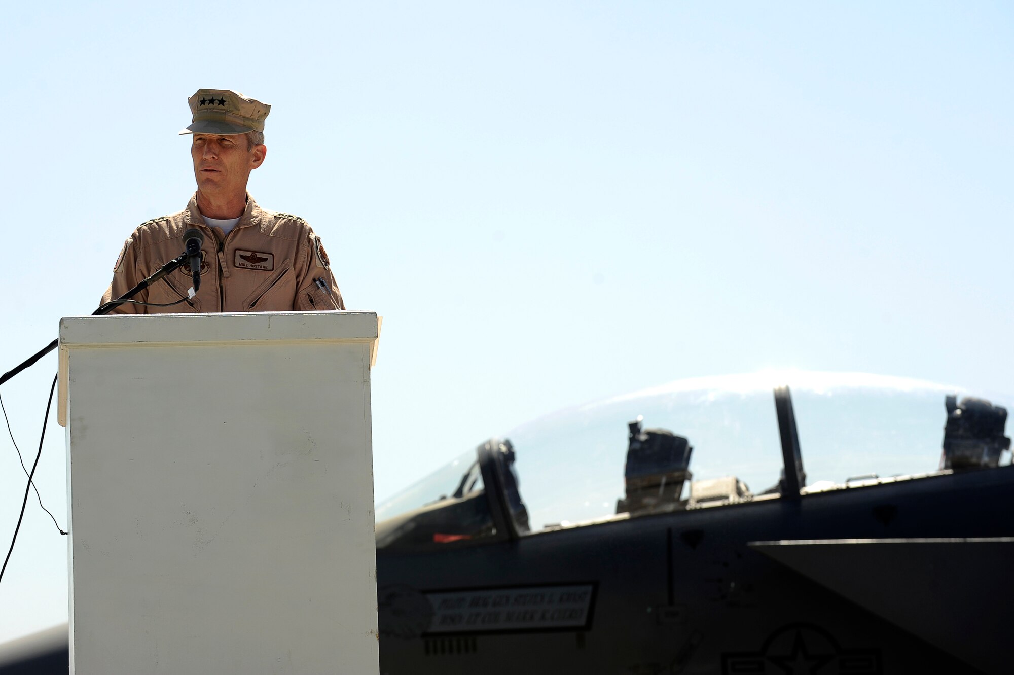 U.S. Air Force Lt. Gen. Mike Hostage III, U.S. Air Forces Central Command commander, provides opening comments during the 455th Air Expeditionary Wing change of command ceremony at Bagram Airfield, Afghanistan, April 23, 2010. During the ceremony, Brig. Gen. Steven Kwast transferred command to Col. Jack Briggs II. (U.S. Air Force photo by/ Tech. Sgt. Jeromy K. Cross/released)