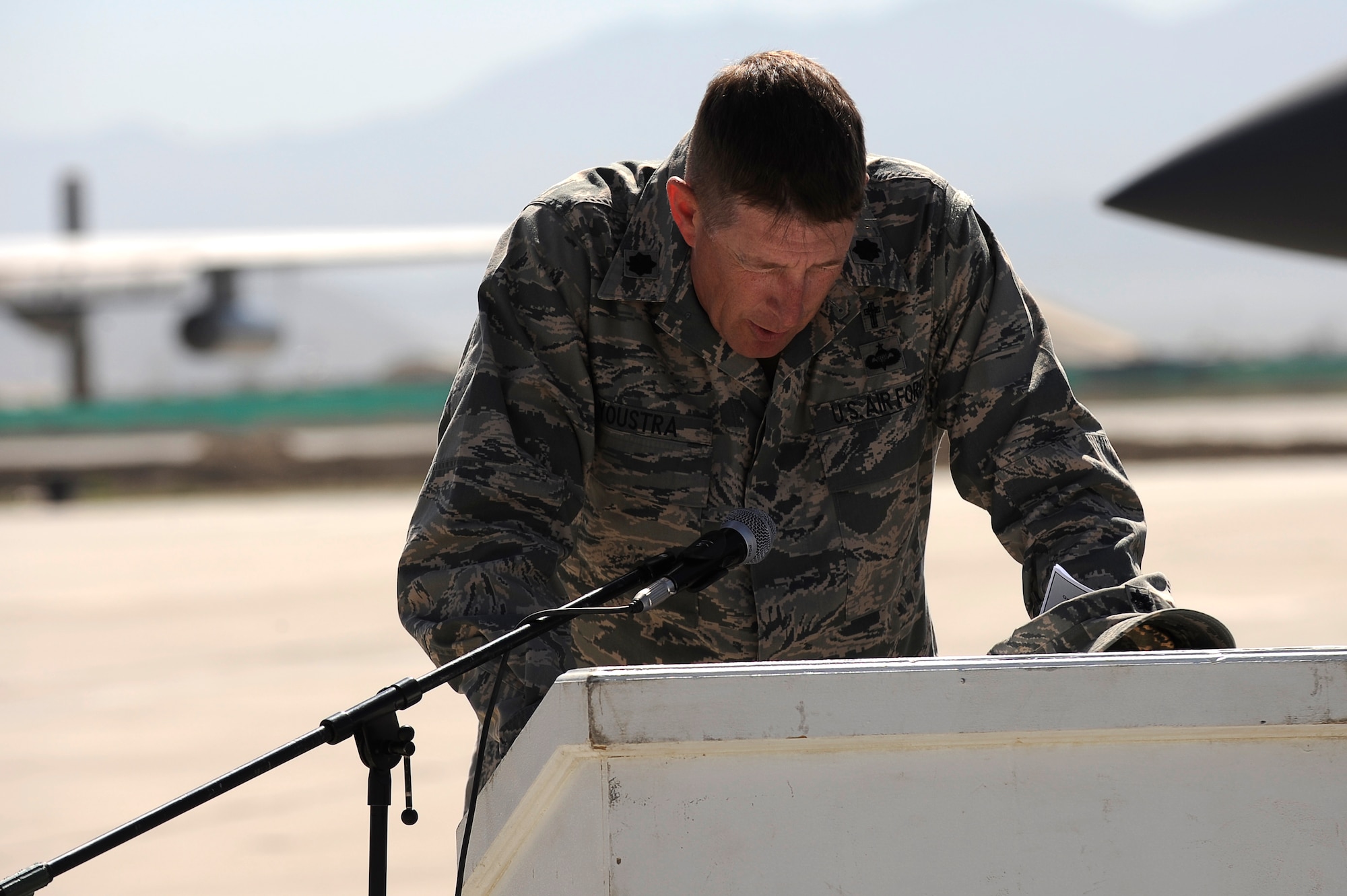 U.S. Air Force Chaplain (Lt. Col.) George Youstra gives the invocation at the 455th Air Expeditionary Wing change of command ceremony at Bagram Airfield, Afghanistan, April 23, 2010. (U.S. Air Force photo by/ Tech. Sgt. Jeromy K. Cross/released)