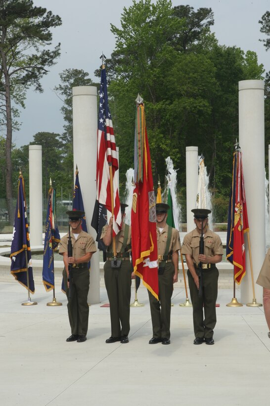 A Marine color guard stands posed during the playing of the National Anthem during the Vietnam Recognition Day at the Lejeune Memorial Gardens, April 24. The event is in remembrance of all Vietnam veterans and the mental and physical scars they live with every day