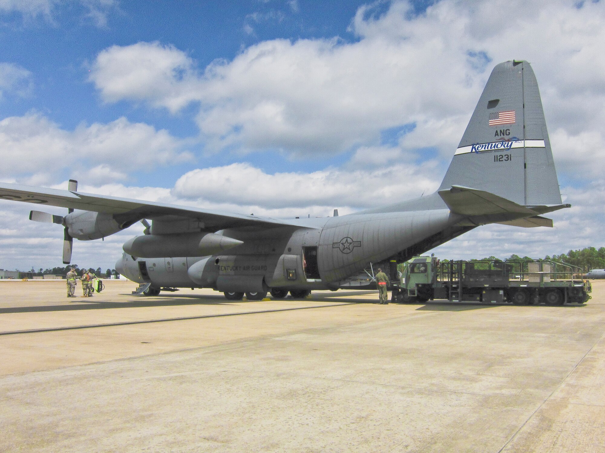 Members of the Kentucky Air National Guard's 123rd Airlift Wing arrive at the Gulfport Combat Readiness Training Center in Gulfport, Miss., on March 21, 2010, as they prepare to stand up operations with members from two other units, the active-duty Air Force's 317th Airlift Group from Dyess Air Force Base, Texas, and the Air Force Reserve's 70th Aerial Port Squadron from Homestead Air Reserve Station, Fla. As part of an Operational Readiness Exercise, all three units formed the 104th Air Expeditionary Wing to provide theater airlift services in support of a simulated G8 Summit in New Orleans. (U.S. Air Force photo/Maj. Dale Greer)