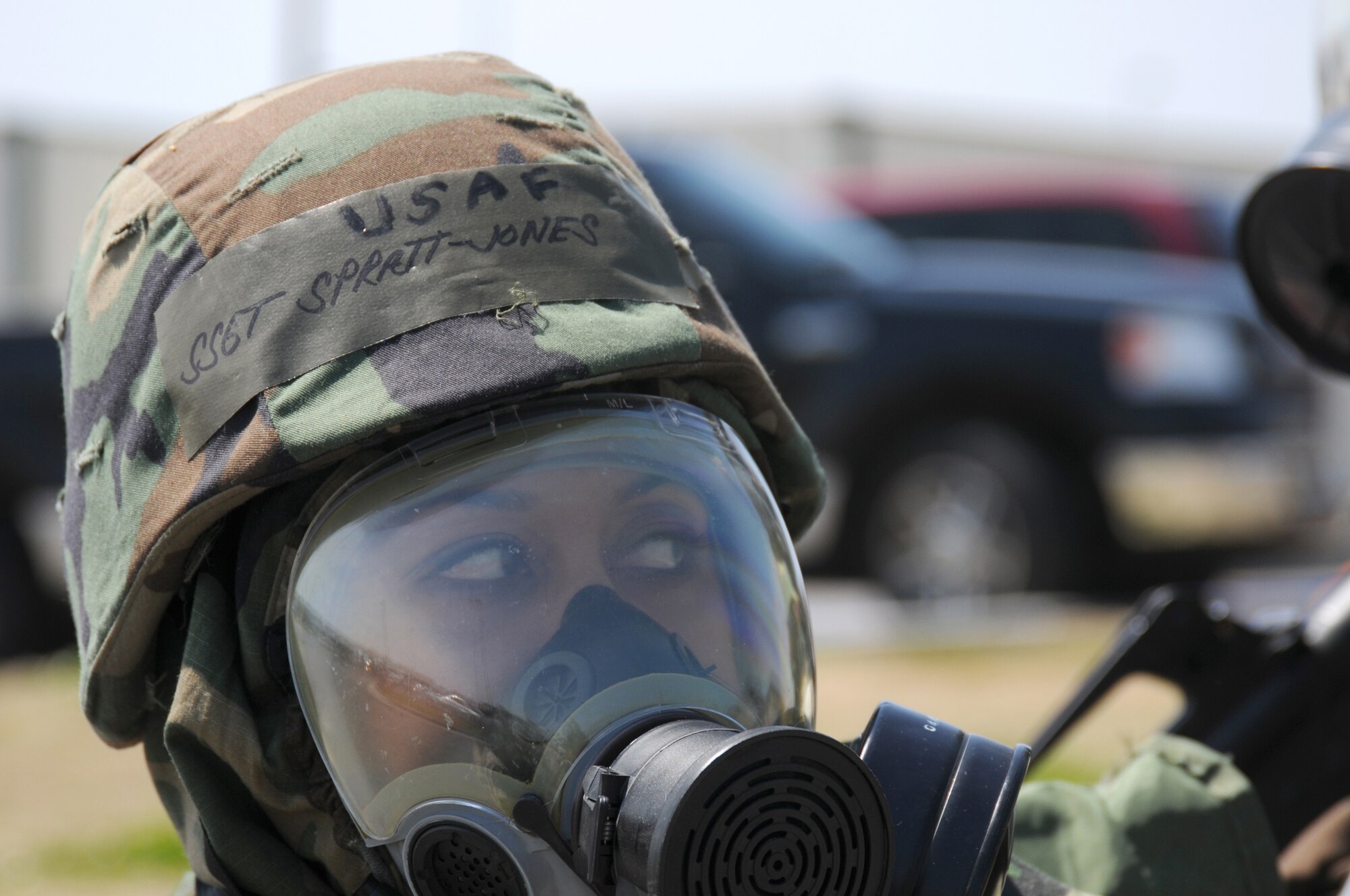 Staff Sgt. Amber Spratt-Jones, 123rd Airlift Wing, takes cover from a simulated enemy attack after ducking into a "fortified" bunker March 24, 2010, during an Operational Readiness Exercise at the Gulfport Combat Readiness Training Center in Gulfport, Miss. Sergeant Jones, a member of the Kentucky Air National Guard, was among several members from her Wing and two other Air Force units to participate in the exercise. (U.S. Air Force photo/Tech. Sgt. Dennis Flora)