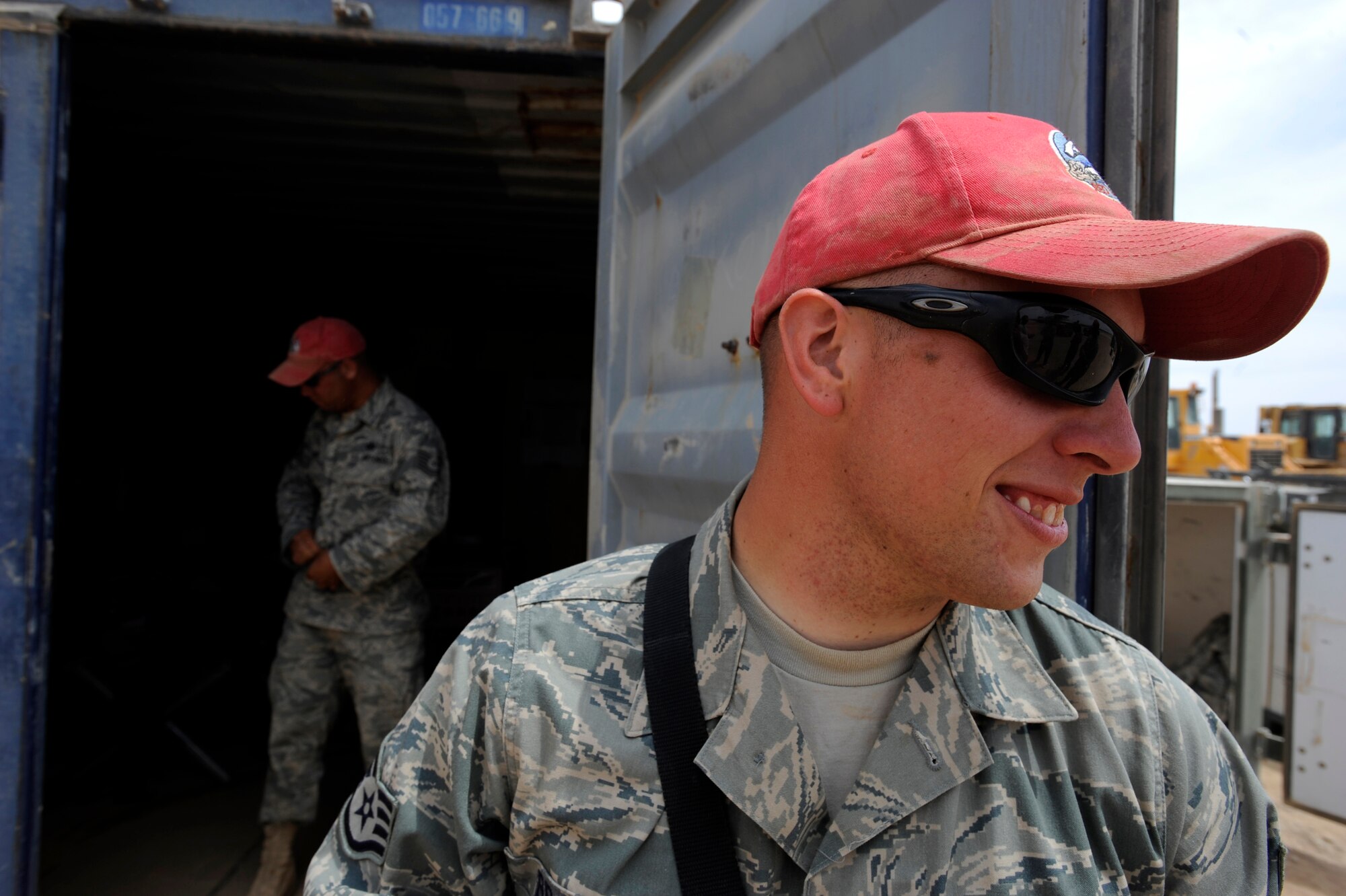 Staff Sgt. Terry Broshious, a vehicle maintainer, and Tech. Sgt. Bill Walter, vehicle maintenance noncommissioned officer in charge, assigned to the 1st Expeditionary RED HORSE Group, get ready to go to lunch, April 19, 2010, at Camp Leatherneck, Afghanistan. (U.S. Air Force photo/Staff Sgt. Manuel J. Martinez/released)