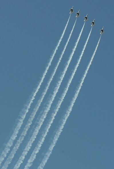 BARKSDALE AIR FORCE BASE, La. – Five of the six F-16 Thunderbirds prepare to perform the line abreast loop during the Barksdale 2010 Defenders of Liberty Air Show. The thunderbirds perform approximately 16 aerial maneuvers during their act. (U.S. Air Force photo by Senior Airman Alexandra M. Longfellow) (RELEASED)