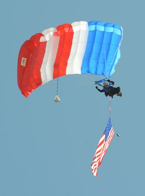 BARKSDALE AIR FORCE BASE, La. – The Barksdale 2010 Defenders of Liberty Air Show kicked off with a skydiving performance featuring the American flag as the National Anthem played April 24. The air show also included performances  such as  the P-51 Mustang, T-6 formation demonstration and the wall of fire. (U.S. Air Force photo by Senior Airman Alexandra M. Longfellow) (RELEASED)