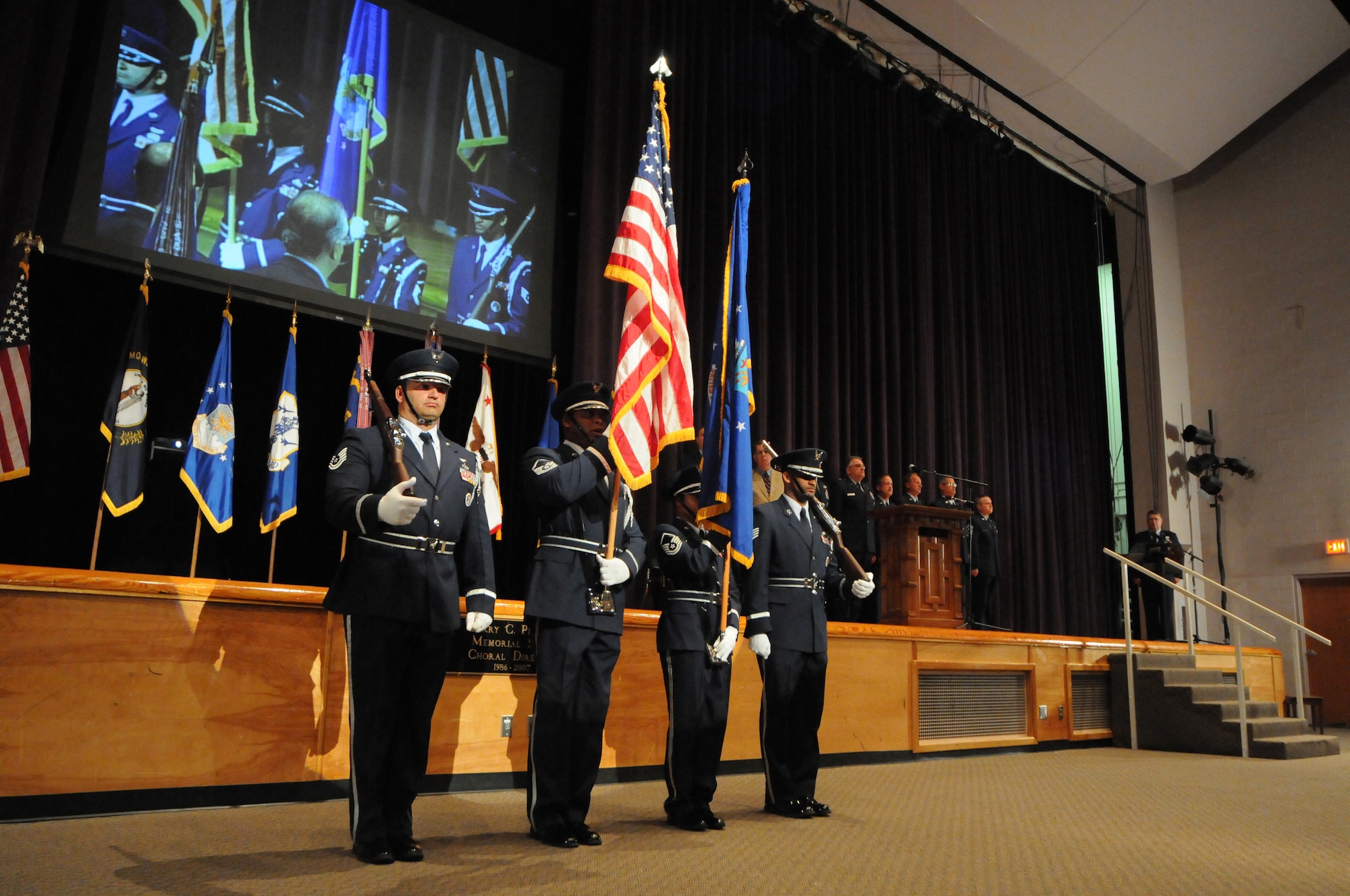 The Base Honor Guard presents the colors April 17, 2010 during a ceremony held at Louisville Male High School in Louisville, Ky., to bestow the 123rd Airlift Wing with its 14th Air Force Outstanding Unit Award. (U.S. Air Force photo/Senior Airman Maxwell Rechel)