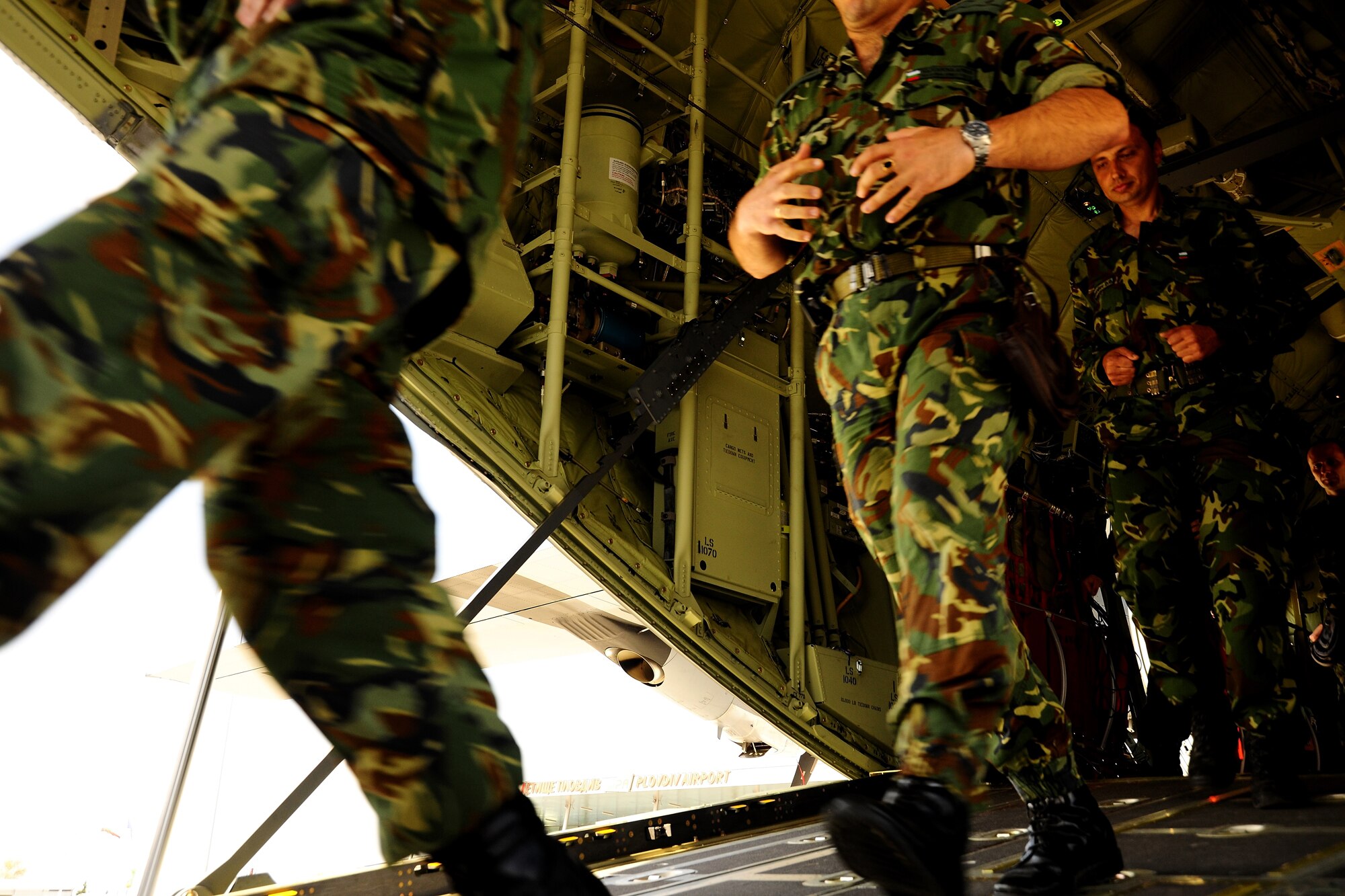 Members of the Bulgarian Special Forces and Search & Rescue teams train to jump from a C-130 J during exercise Thracian Spring 2010 at Plovdiv Airport, April 22, 2010. Personnel from the 86th Airlift Wing and 435th Air and Ground Operations Wing are deployed to Plovdiv, Bulgaria in support of Thracian Spring. Thracian Spring is an exercise composed of aircrew, maintenance, airfield management, aerial port, security forces, and logistics personnel that combine their skill in an effort to build and strengthen the United States and Bulgarian Air Forces’ bond while improving interoperability with our partner NATO nation. (U.S. Air Force photo by Master Sgt. Quinton T. Burris)