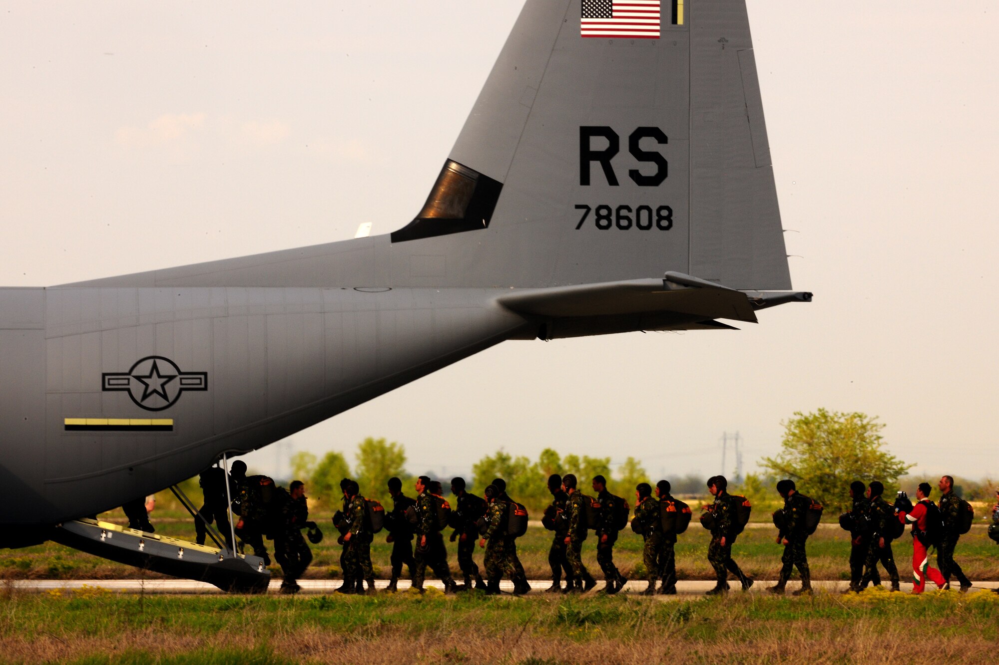 Bulgarian 68th Special Forces Brigade members load onto a U.S. Air Force C-130J for a static line jump during exercise Thracian Spring 2010 at Plovdiv Airport, April 23, 2010. Personnel from the 86th Airlift Wing and 435th Air and Ground Operations Wing are deployed to Plovdiv, Bulgaria in support of Thracian Spring. Thracian Spring is an exercise composed of aircrew, maintenance, airfield management, aerial port, security forces, and logistics personnel that combine their skill in an effort to build and strengthen the United States and Bulgarian Air Forces’ bond while improving interoperability with our partner NATO nation. (U.S. Air Force photo by Master Sgt. Quinton T. Burris)