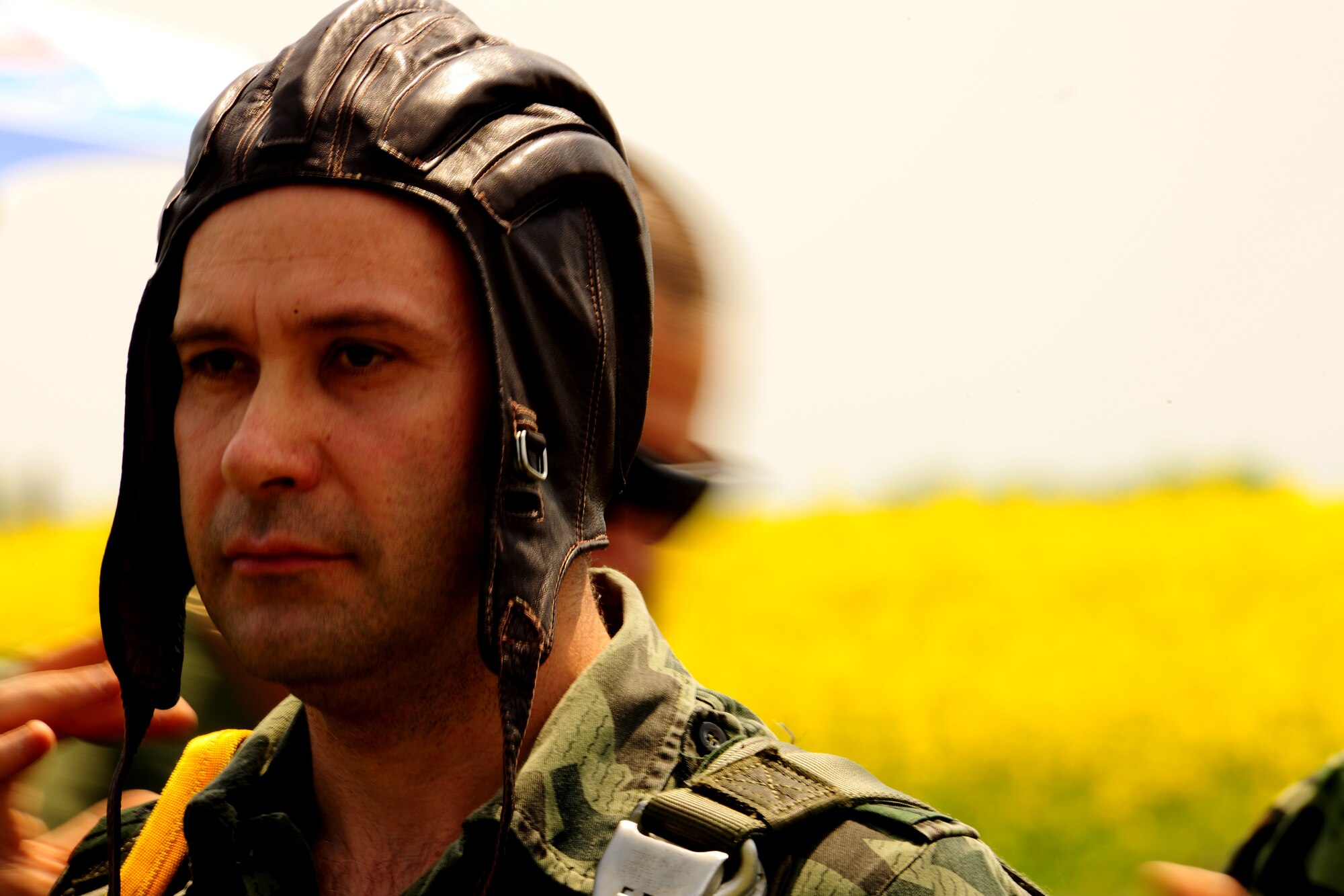 A Bulgarian 68th Special Forces Brigade member prepares for a static line jump from an U.S. Air Force C-130J during exercise Thracian Spring 2010 at Plovdiv Airport, April 23, 2010. Personnel from the 86th Airlift Wing and 435th Air and Ground Operations Wing are deployed to Plovdiv, Bulgaria in support of Thracian Spring. Thracian Spring is an exercise composed of aircrew, maintenance, airfield management, aerial port, security forces, and logistics personnel that combine their skill in an effort to build and strengthen the United States and Bulgarian Air Forces’ bond while improving interoperability with our partner NATO nation. (U.S. Air Force photo by Master Sgt. Quinton T. Burris)