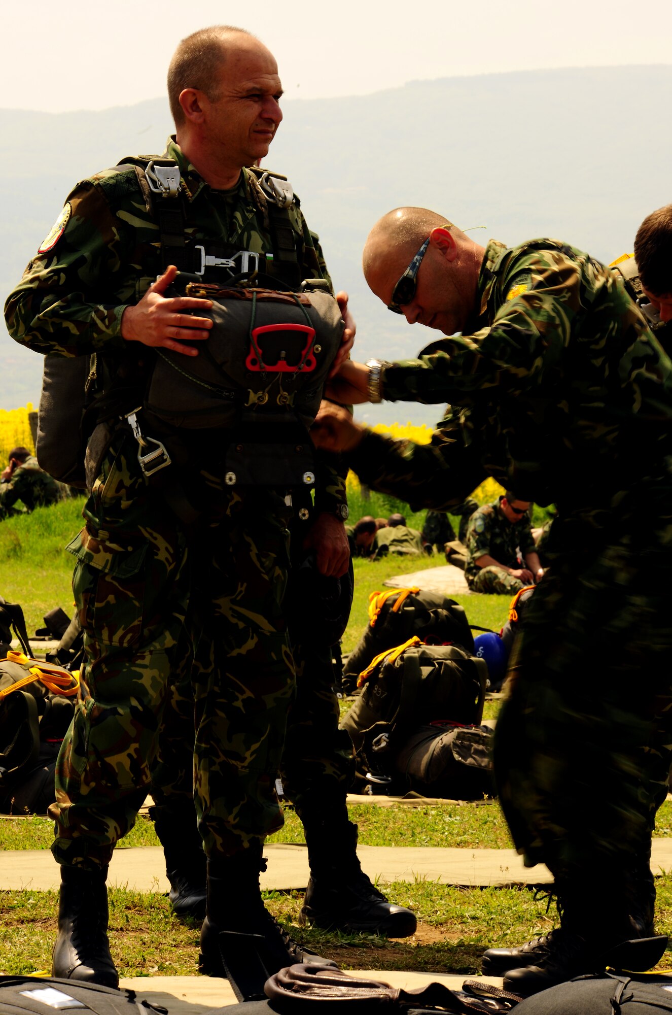 Bulgarian Brig. Gen. Plamen Lilov, 68th Special Force Brigade Commander, prepares for a static line jump from an U.S. Air Force C-130J during exercise Thracian Spring 2010 at Plovdiv Airport, April 23, 2010. Personnel from the 86th Airlift Wing and 435th Air and Ground Operations Wing are deployed to Plovdiv, Bulgaria in support of Thracian Spring. Thracian Spring is an exercise composed of aircrew, maintenance, airfield management, aerial port, security forces, and logistics personnel that combine their skill in an effort to build and strengthen the United States and Bulgarian Air Forces’ bond while improving interoperability with our partner NATO nation. (U.S. Air Force photo by Master Sgt. Quinton T. Burris)