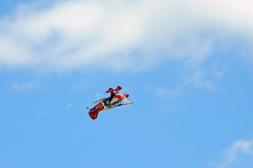 BARKSDALE AIR FORCE BASE, La. -- Jacquie B performs an upside down maneuver during the Barksdale 2010 Defenders of Liberty Air Show here April 25. Her Pitts Special biplane has been acknowledged as the world's leading competition aerobatic and air show display biplane. She has logged more than 1,600 hours of flying in the last 10 years. This is her first time performing at Barksdale. (U.S. Air Force photo by Senior Airman La'Shanette V. Garrett)(Released)