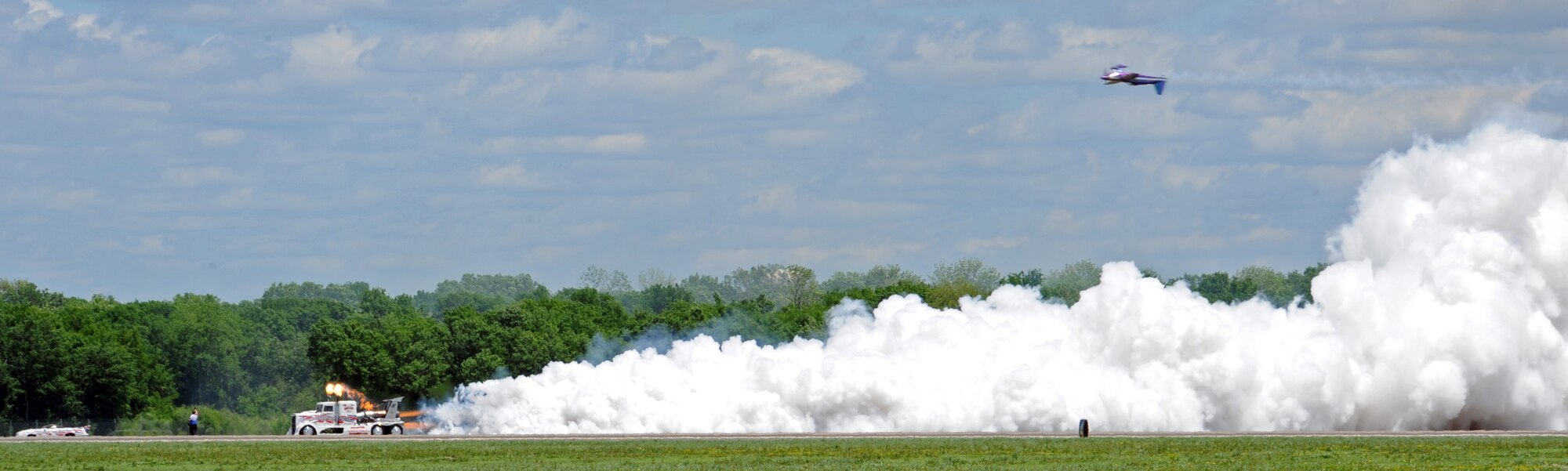 BARKSDALE AIR FORCE BASE, La. -- Bill Stein races the Shockwave Jet truck during the Barksdale 2010 Defenders of Liberty Air Show here April 25. The Shockwave Jet Truck runs over 300 miles per hour racing airplanes at air shows; holds the world record in a quarter mile for trucks at 256 mph in just 6.36 seconds. It also, holds the world record for full size trucks at 376 mph as recorded by Guinness Book of World Records. At 36,000 horsepower, the shockwave has enough power to accelerate at 3 Gs vertical, which is as much as the Space Shuttle. (U.S. Air Force Photo by Senior Airman La'Shanette V. Garrett)(RELEASED)