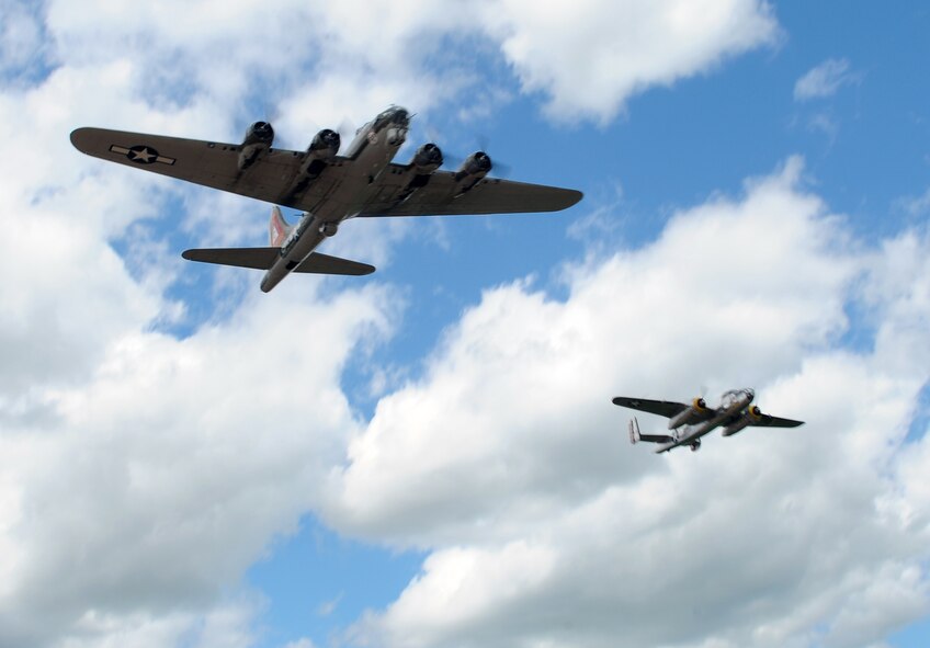 BARKSDALE AIR FORCE BASE, La. -- A B-17 and B-25 bomber participates in the Bomber Parade during the Barksdale 2010 Defenders of Liberty Air Show here April 25. The Bomber Parade included a B-17, B-24, B-25 and B-52. (U.S. Air Force photo by Senior Airman La'Shanette V. Garrett)(Released)