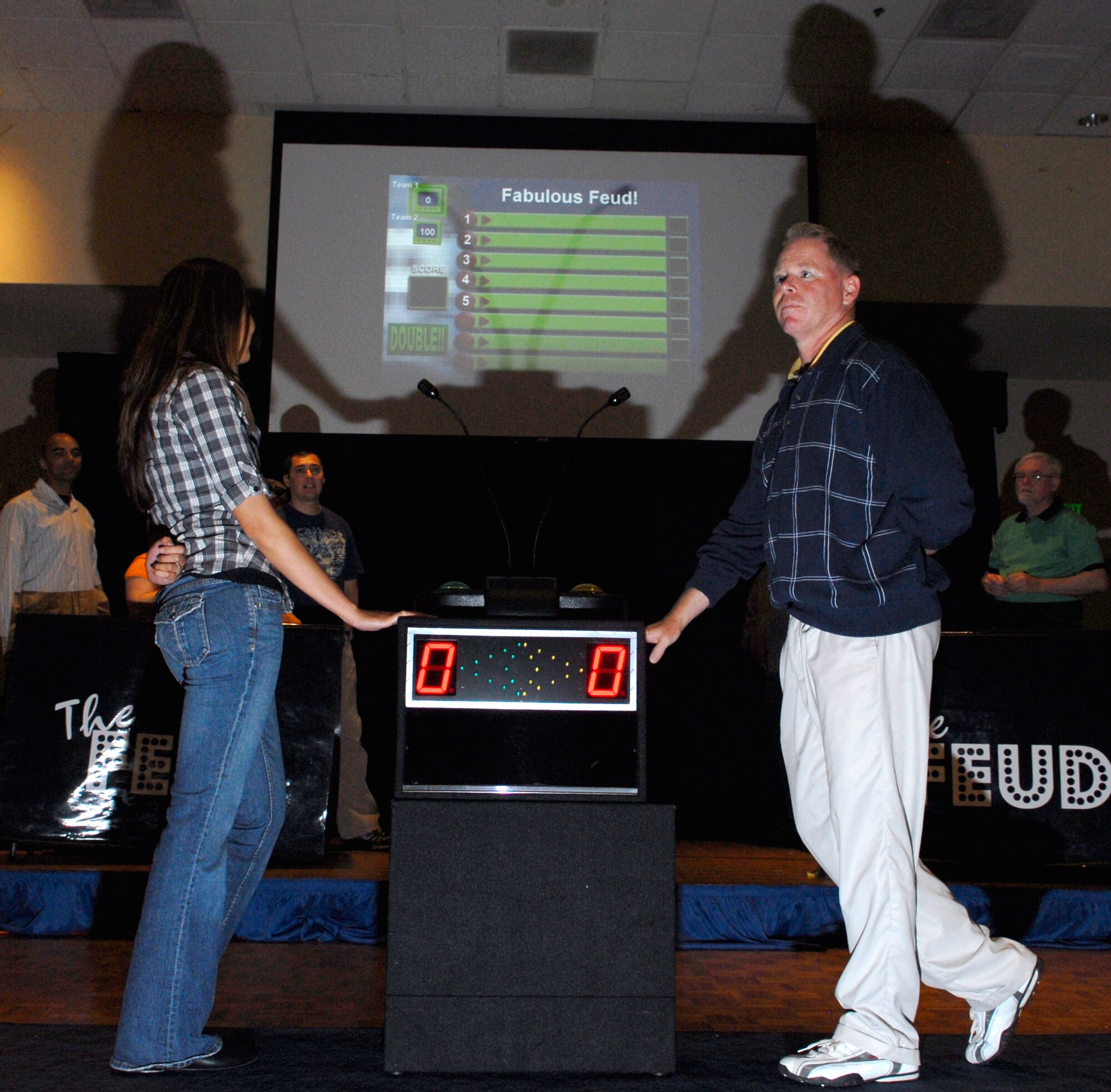VANDENBERG AIR FORCE BASE, Calif. -- Chief Master Sgt. Frank Barbe represents his team, The Chiefs, by facing off with an opposing contestant during the Vandy Fued at the Pacific Coast Club here Friday, April 23, 2010. The Vandy Fued game show consisted of approximately 20 teams. (U.S. Air Force photo/Senior Airman Ashley Reed)