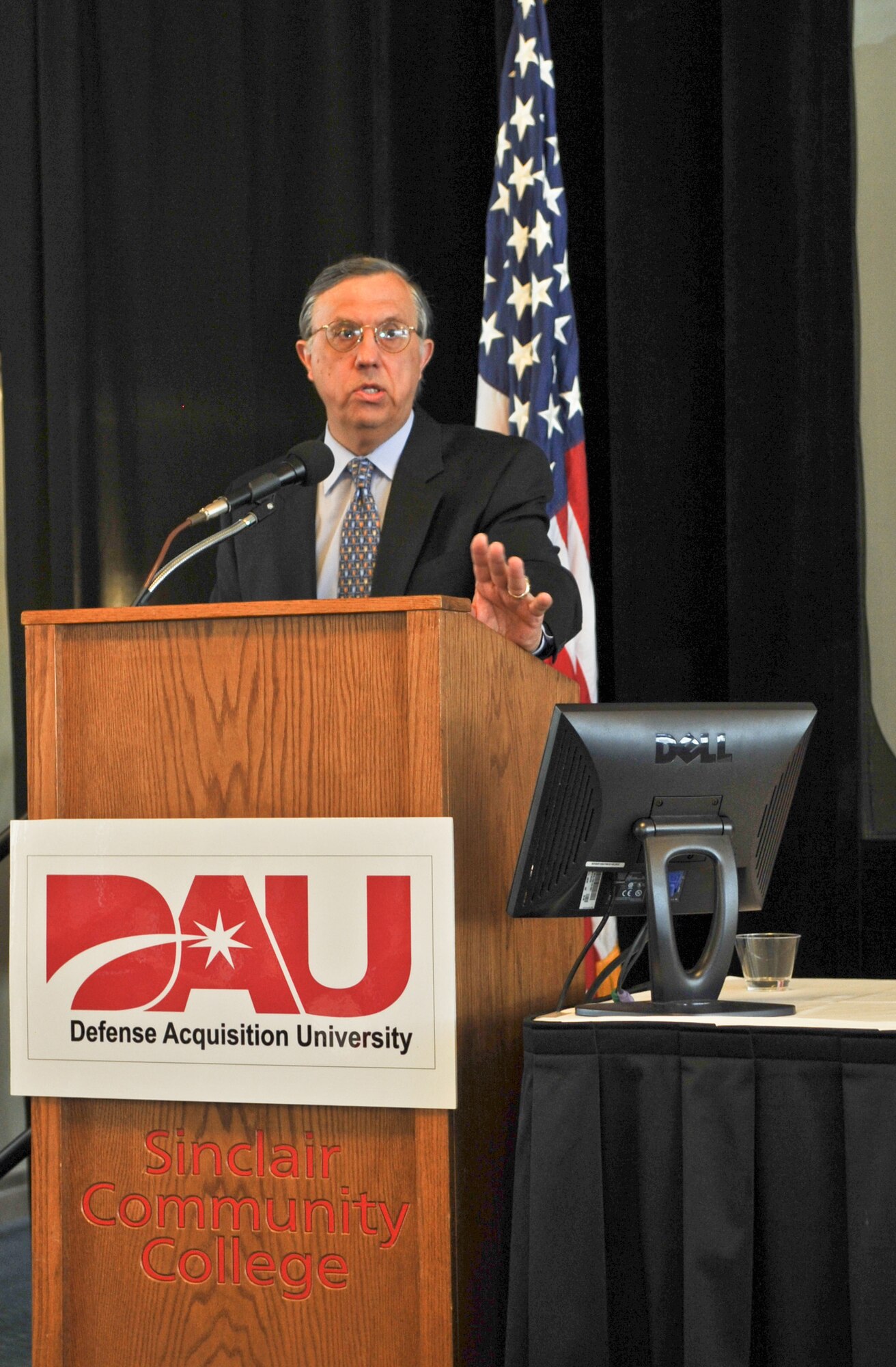 Mr. Shay Assad speaks to attendees of the DoD Acquisition Insight Conference April 21, 2010 at Sinclair Community College in Dayton, Ohio.  The conference, sponsored by the Defense Acquisition University, focused on challenges faced by the Defense Department’s acquisition workforce.  Mr. Assad is director of Defense Procurement and Acquisition Policy. (DoD photo/Erica Kobren)