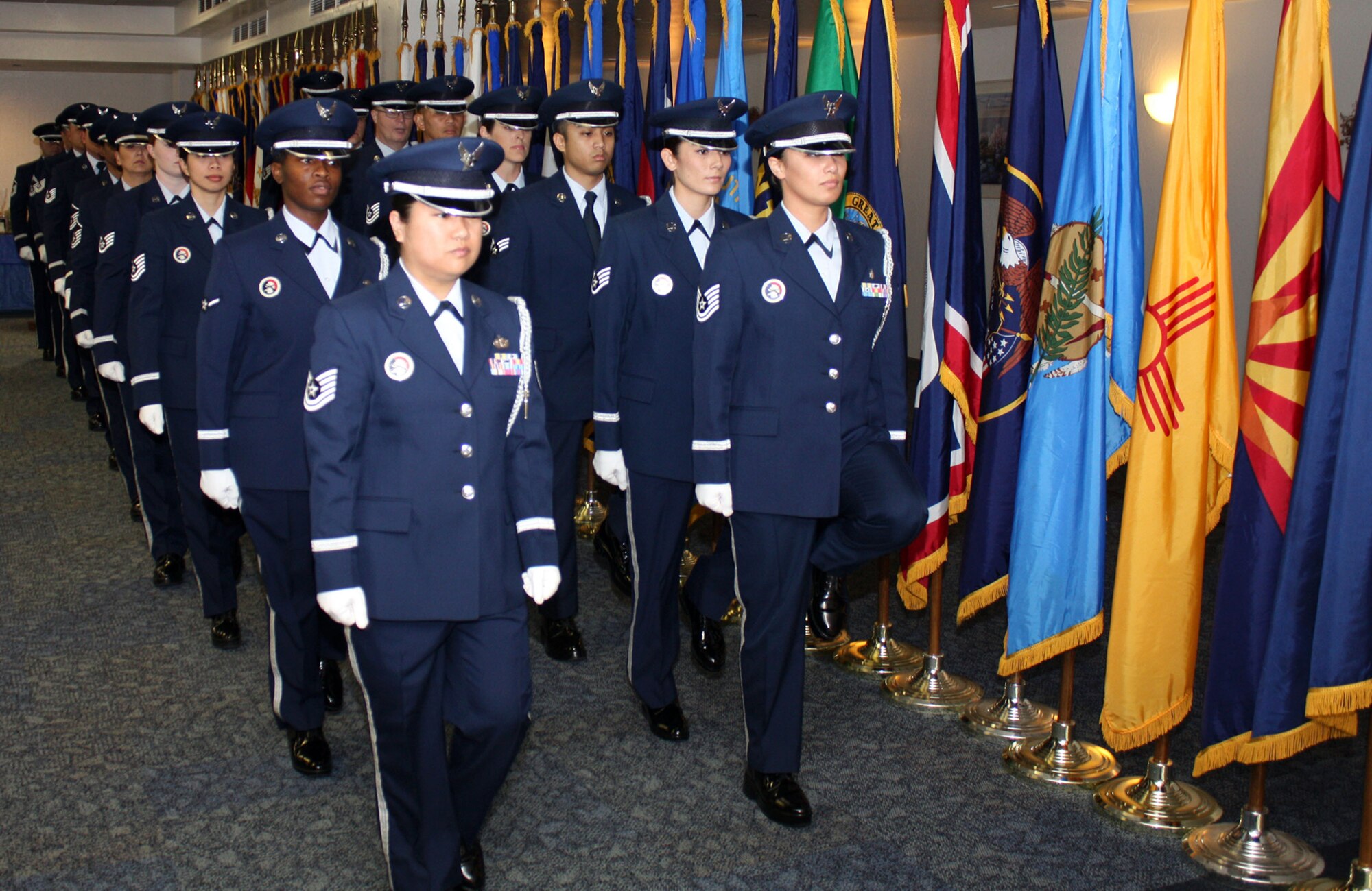 TRAVIS AIR FORCE BASE, Calif. -- Members of the 349th Air Mobility Wing’s Honor Guard enter in formation here during the start of the 349th Wing Honor Guard Recognition Luncheon. The Honor Guard members were being honored for their service to the wing and those who serve ‘above and beyond.’ (U.S. Air Force photo/Master Sgt. Robert Wade)