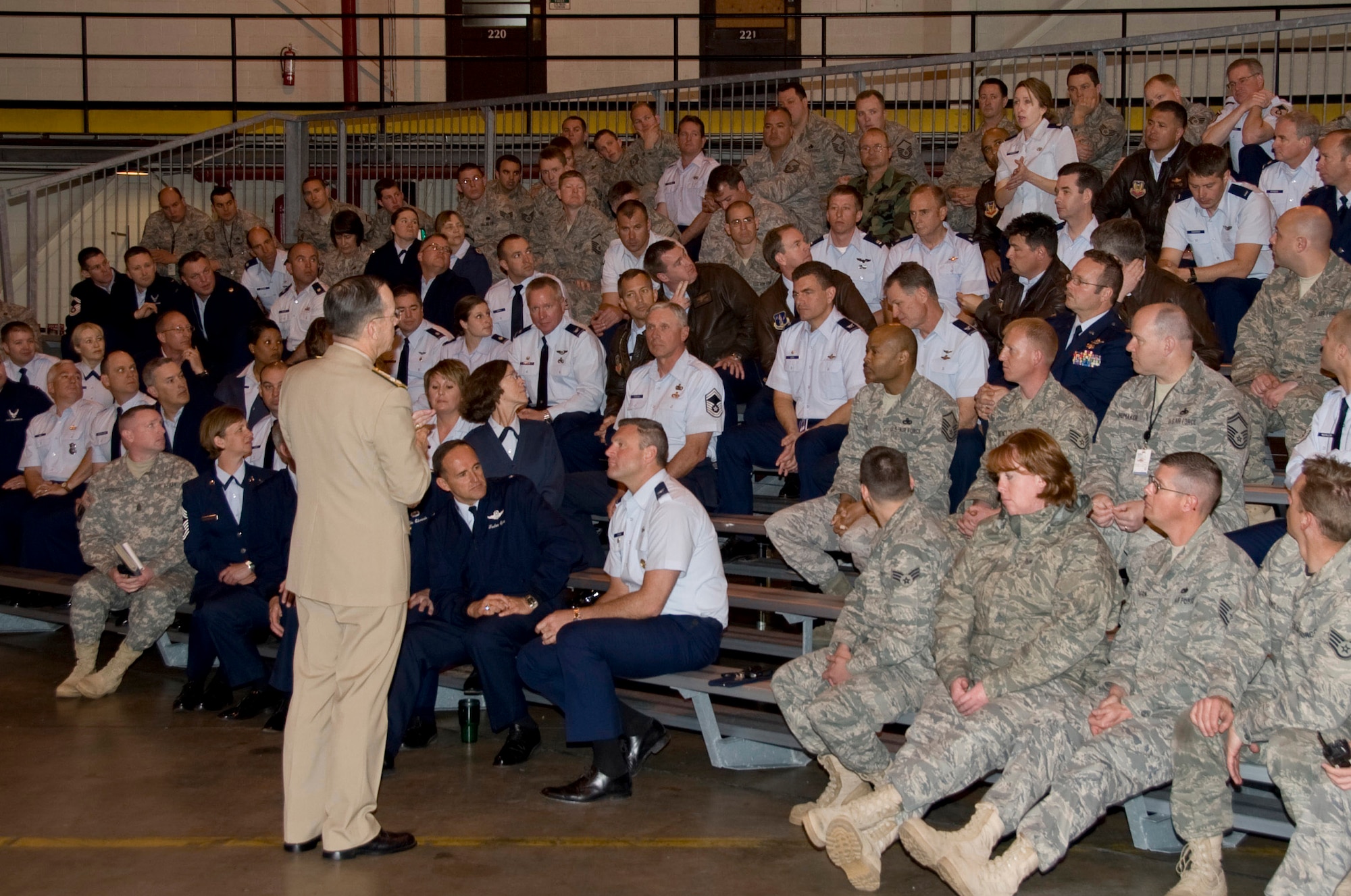 Admiral Mike Mullen, Chairman of the Joint Chiefs of Staff, conducted a Town Hall meeting with members of the 140th Wing, Colorado Air National Guard Monday.  During the meeting, members of the Air National Guard posed questions concerning the future of the Guard.  Picture here, Lt. Col. Gina Simonson, 140th Wing Staff Judge Advocate, poses a question regarding plans to include Title 32 members in the post 9/11 G.I. Bill.  (U.S. Air Force Photo/SMSgt John Rohrer) ( RELEASED)