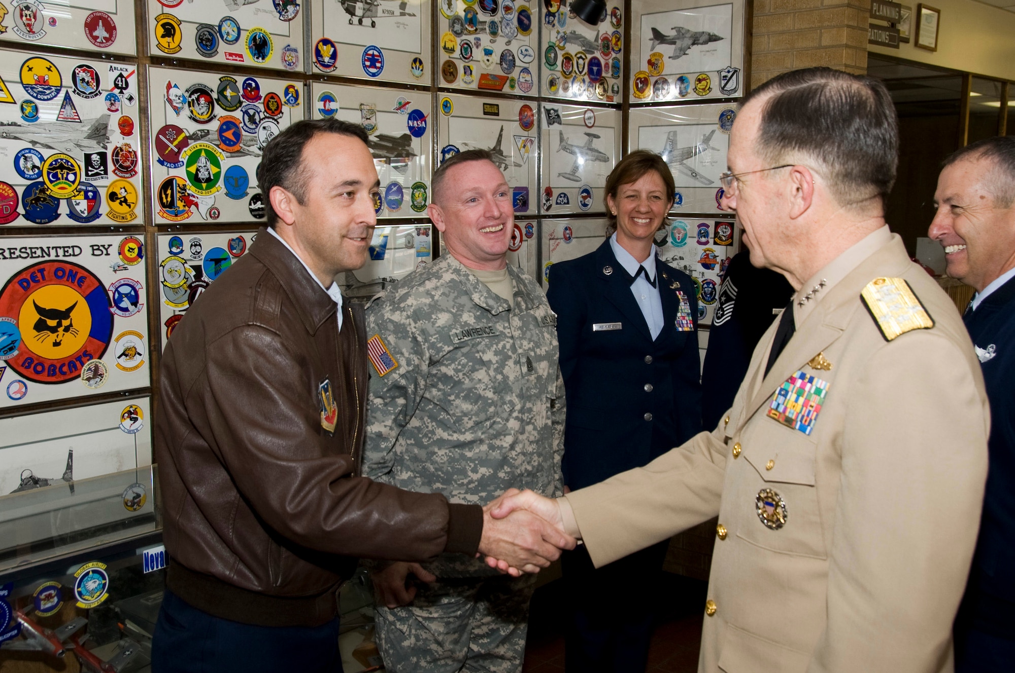 Admiral Mike Mullen, Chairman of the Joint Chiefs of Staff, conducted a Town Hall meeting with members of the 140th Wing, Colorado Air National Guard Monday.  During the meeting, members posed questions concerning the future of the Guard.  Picture here, Lt. Col. Timothy Conklin, 140th Operations Support Squadron Commander, greets Admiral Mullen prior to the Town Halll meeting. (U.S. Air Force Photo/SMSgt John Rohrer) (RELEASED)