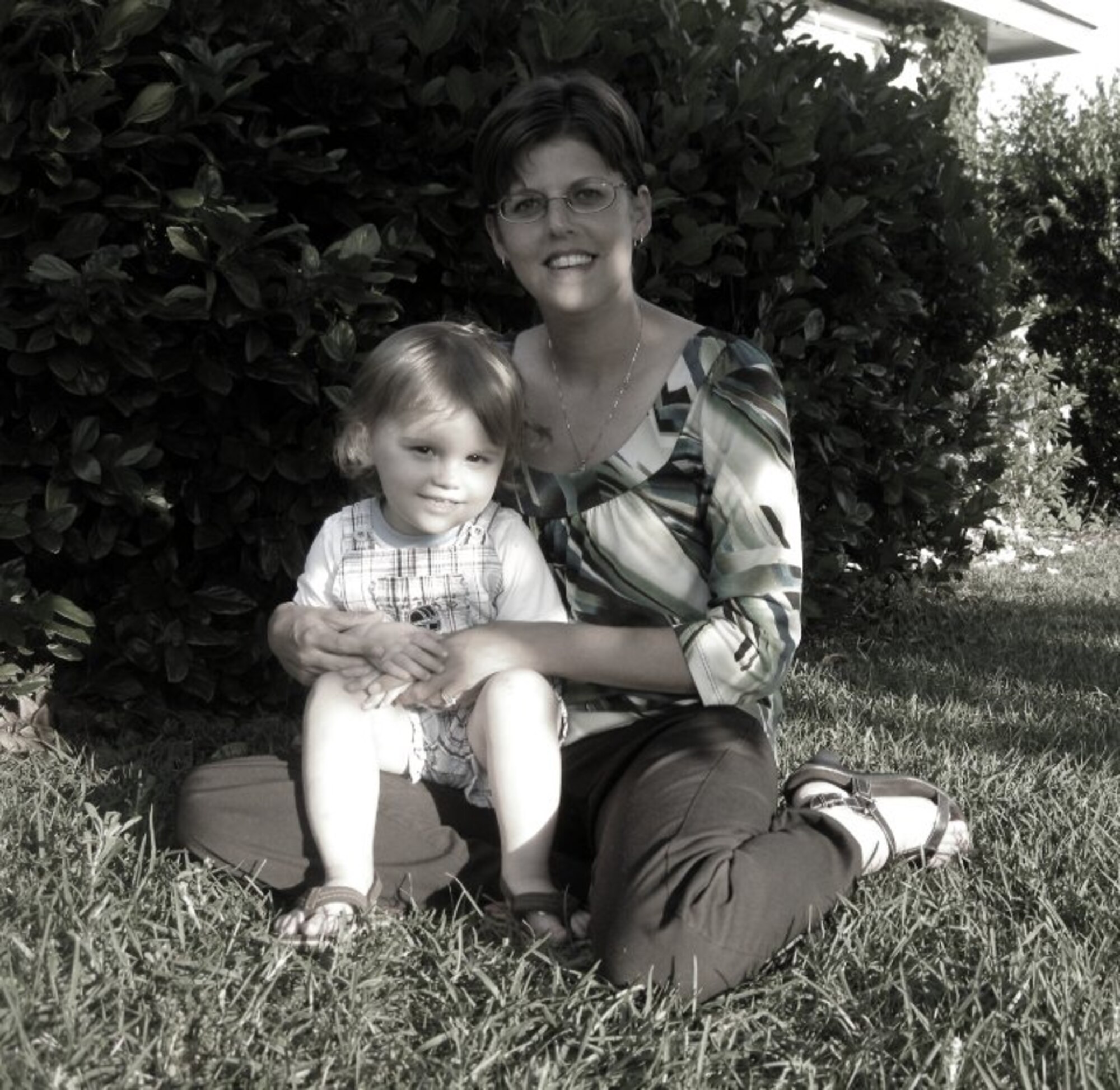 VALDOSTA, Ga. -- Sabrina and Landon Carter, wife and son of Staff Sgt. Nathan Carter, 823rd Expeditionary Security Forces Squadron squad leader, pose here April 22. While Airmen are deployed, spouses take over many everyday responsibilities such as mowing the lawn, paying the bills and most importantly, caring for children. (Contributed photo/RELEASED)