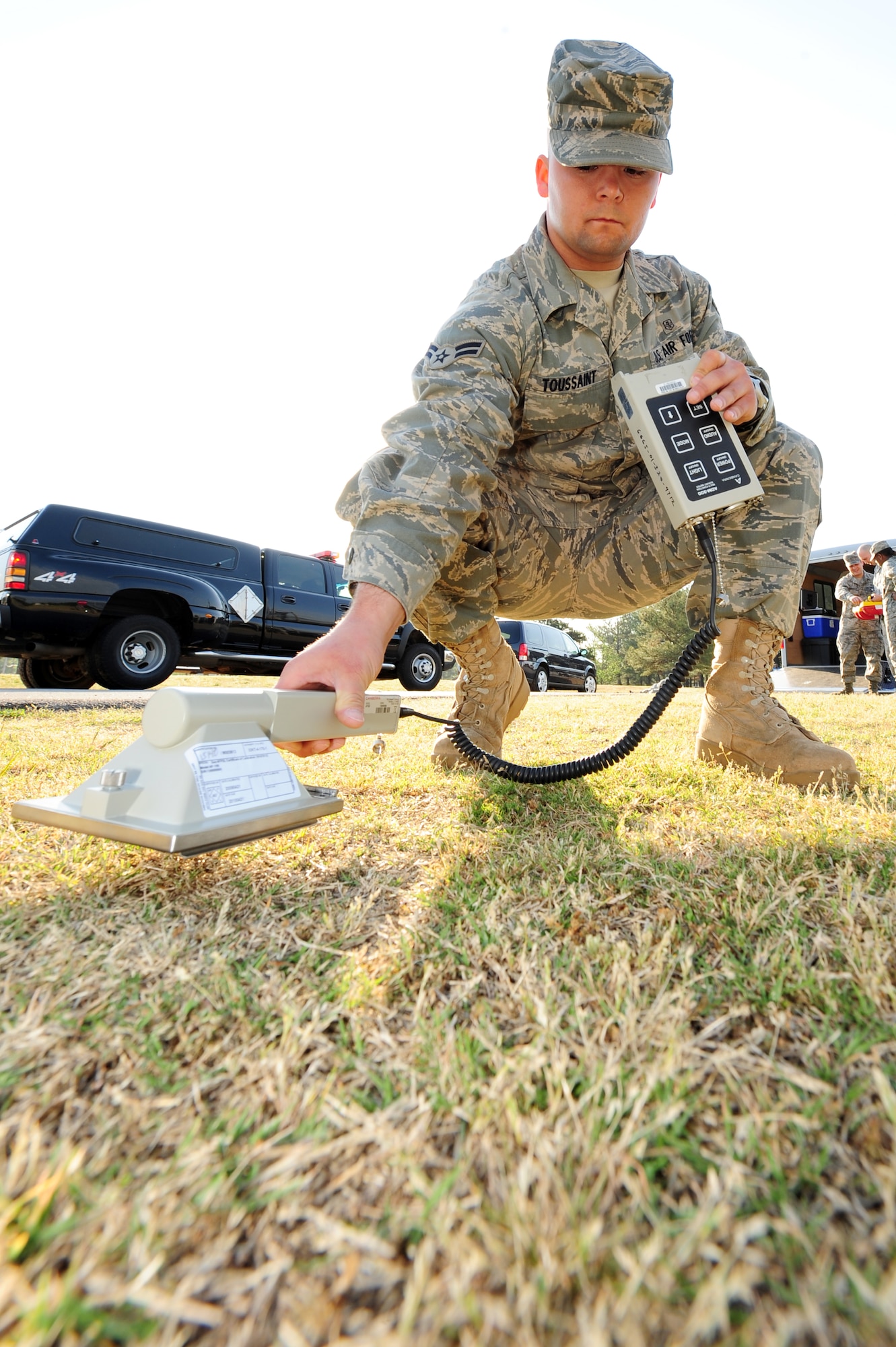 Airman 1st Class Jason Toussaint, a 19th Aerospace Medicine Squadron bio-environmental technician, detects for radiation April 21 during an exercise on base. The men and women of the 19th Airlift Wing were put to the test during an explosion scenario as part of the unit compliance inspection. (U.S. Air Force photo by Senior Airman Steele C. G. Britton)