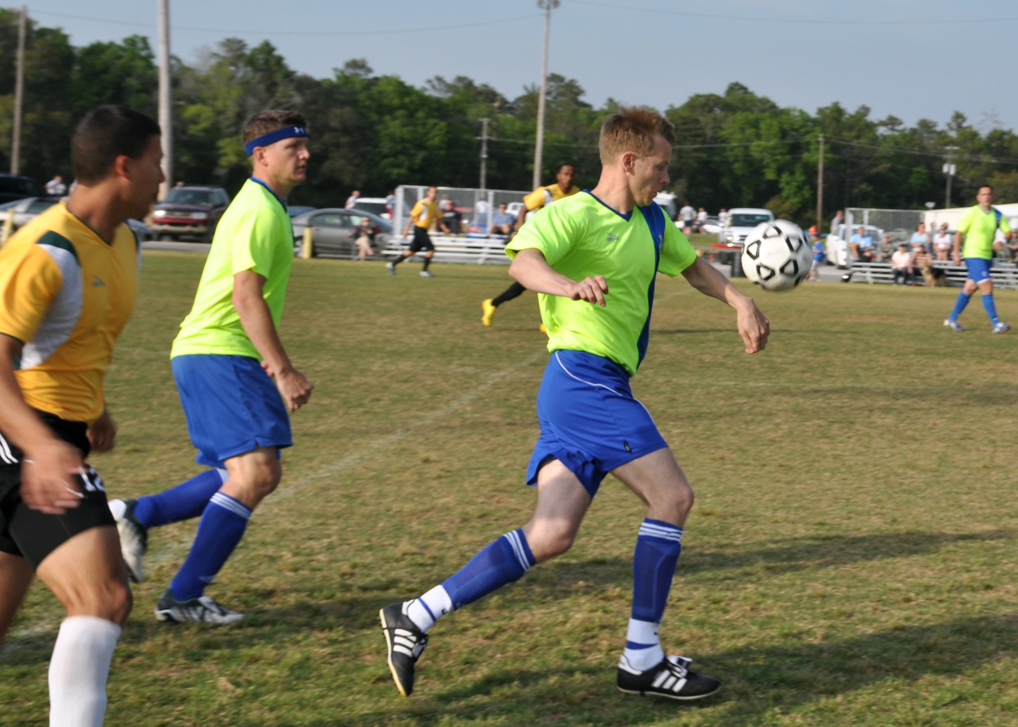 EGLIN AIR FORCE BASE, Fla. – A 53rd Wing player narrowly avoids a hand penalty during a drive downfield April 22. The 46th Test Wing reclaimed the title winning 2-1 against the 53rd during the intramural soccer championship. 53rd was the reigning champs, beating the 46th in a sudden death shootout in overtime last year. (U.S. Air Force photo/ Airman 1st Class Anthony Jennings)