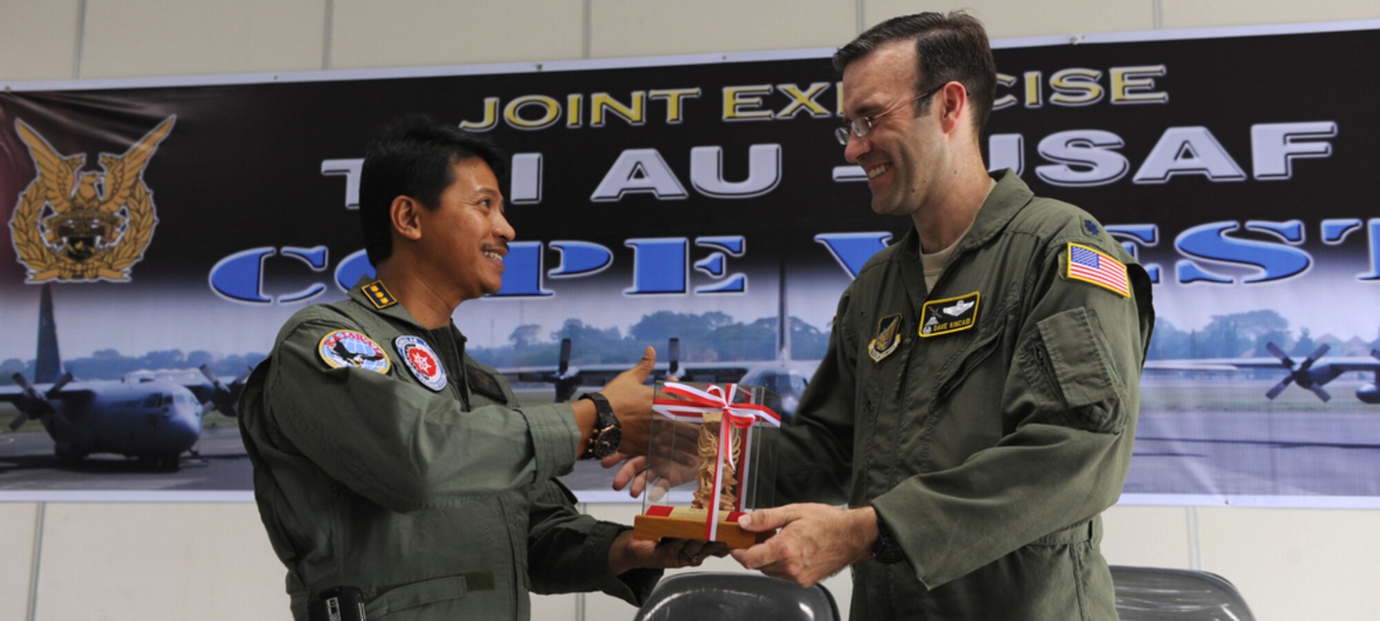 The Halim Air Base commander, Indonesia air force Colonel Djoko Senoputro (left) shakes hands with the 36th Airlift Squadron commander, Lt. Col. Dave Kincaid at the closing ceremony of Cope West 10 on April 23 at Halim AB, Indonesia. Cope West is a Pacific Air Forces sponsored bilateral tactical airlift exercise involving the U.S. and Indonesian air forces. The exercise is designed to advance interoperability between the U.S. and Indonesian air forces, and promote cooperation and unity of purpose.  (U.S.  Air Force photo/Tech Sgt. Cohen A. Young)