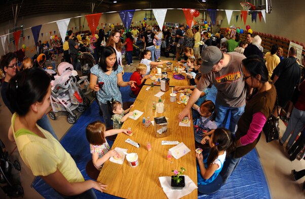 OFFUTT AIR FORCE BASE, Neb. -- Hundreds of military family members attend the 2010 Family Fun Fair at the Youth Center here April 24. During the event, attendees took part in numerous activities including face painting, coloring, horseback riding and much more. U.S. Air Force Photo by Josh Plueger
