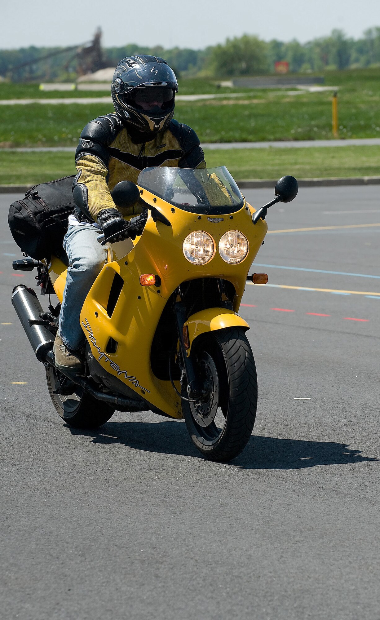 Master Sgt. Mike Hamblin, 436th Operations Group C-17 evaluator and Motorcycle Safety Foundation rider coach, demos a ?quick-stop exercise? for Motorcycle Safety and Awareness Day April 23. Attendees practiced this technique to improve their emergency stops. (U.S. Air Force photo/ Brianne Zimny)