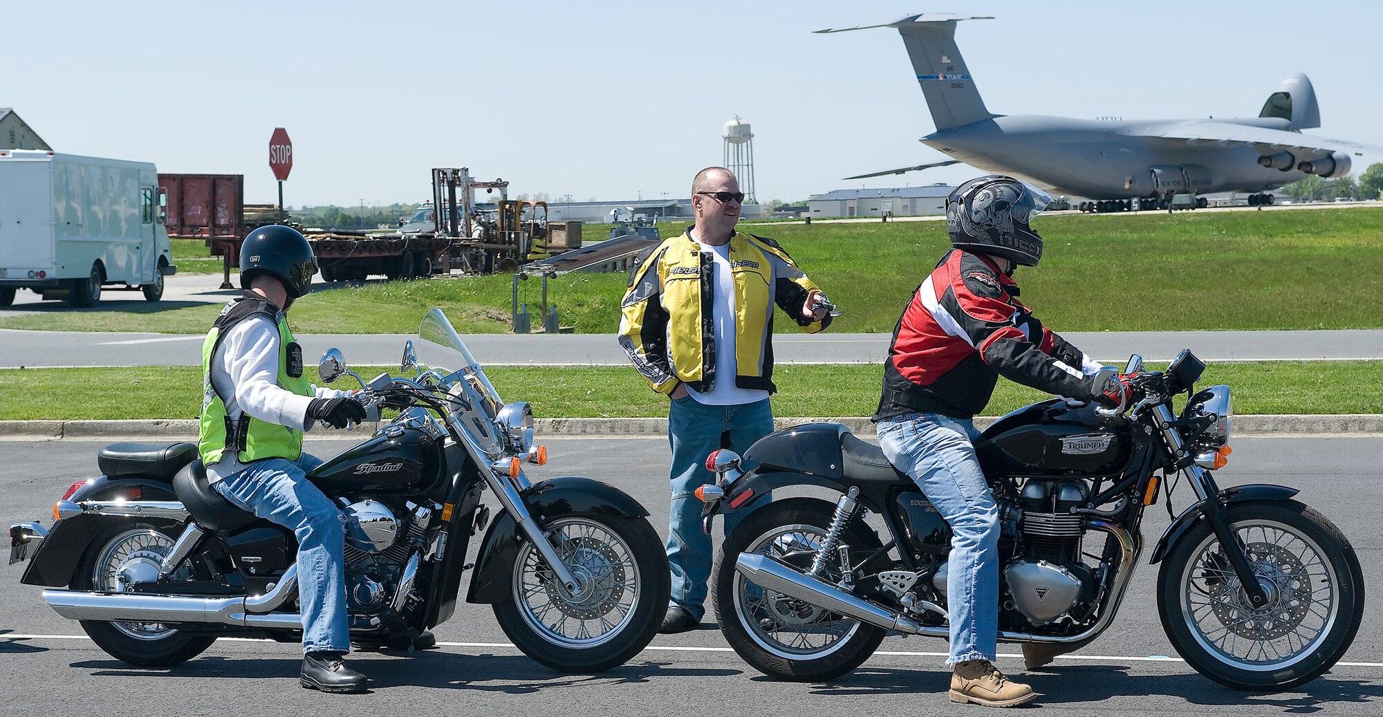 Senior Master Sgt. Edward Renneckar, 436th Airlift Wing, briefs Team Dover motorcyclists before the start of the quick-stop exercise during the Motorcycle Safety and Awareness Day April 23 hosted by the 436th Operations Group. (U.S. Air Force photo/ Brianne Zimny)
