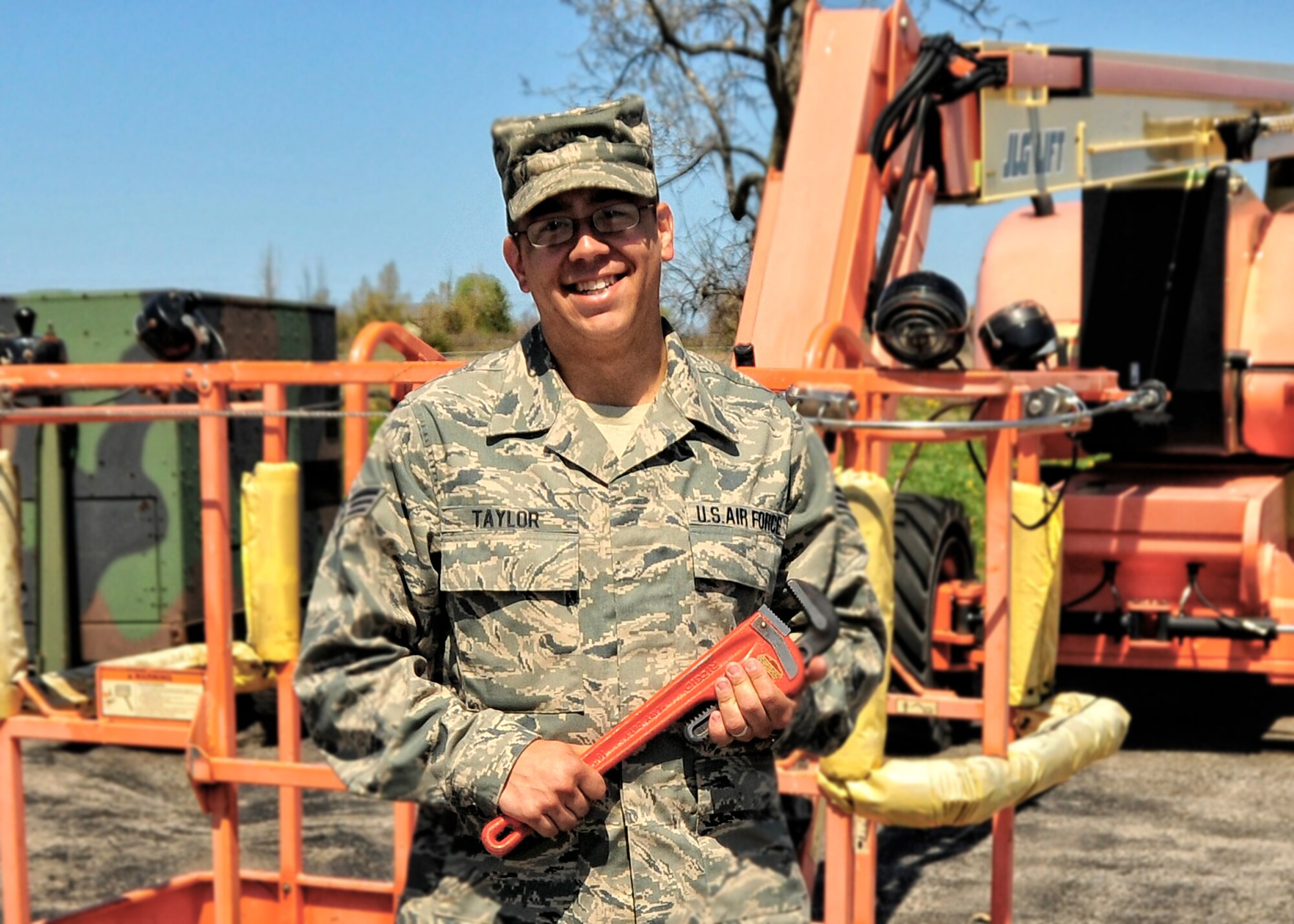 U.S. Senior Airman John T. Taylor with the 914th Airlift Wing, Niagara Falls Air Reserve Station helps a person in need, April 21, 2010, Lockport NY. Taylor helped thwart an attempted robbery by subduing an armed man until police arrived. (U.S. Air Force photo by Staff Sgt. Joseph McKee)